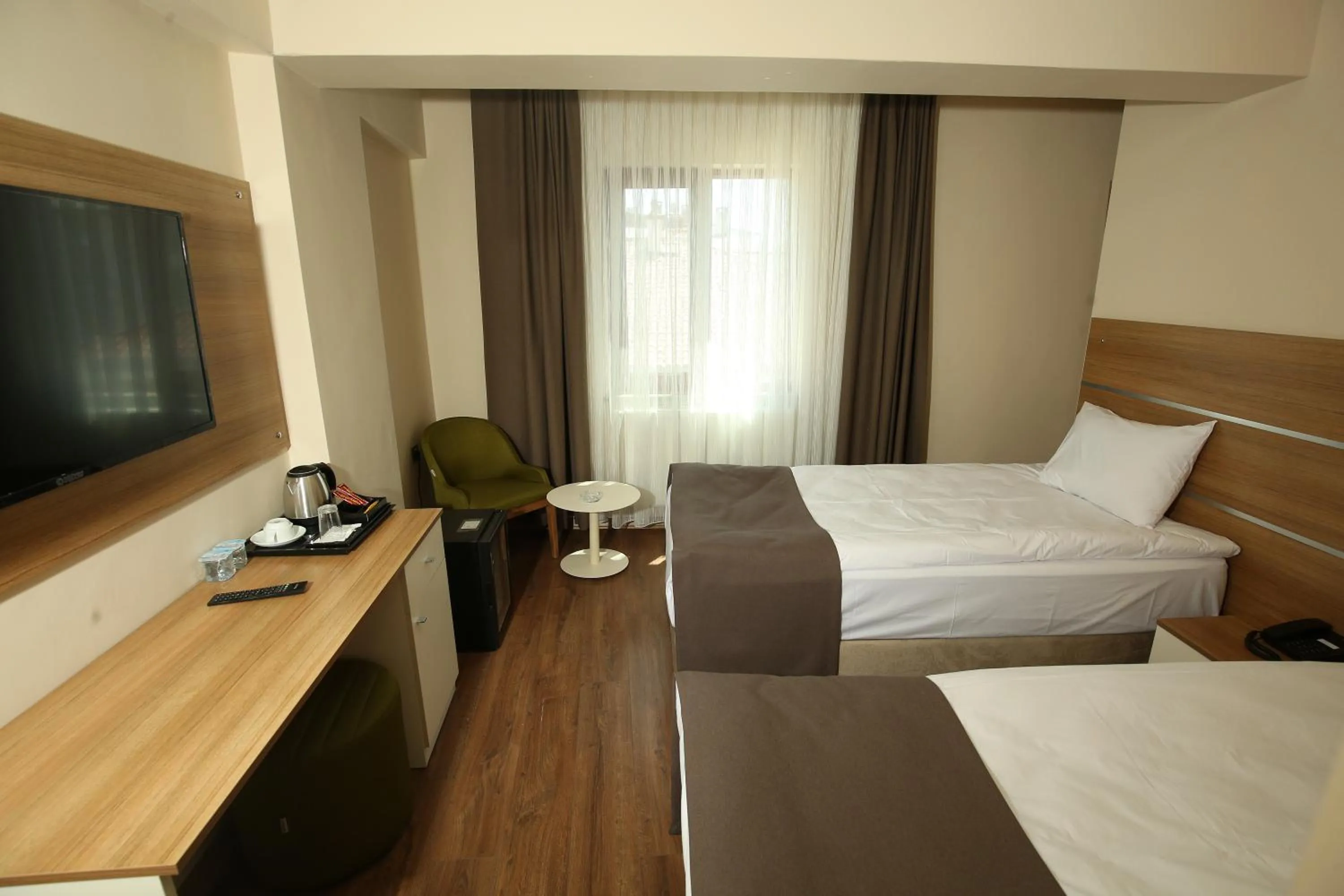 Bed in BEYAZ İNCİ OTEL