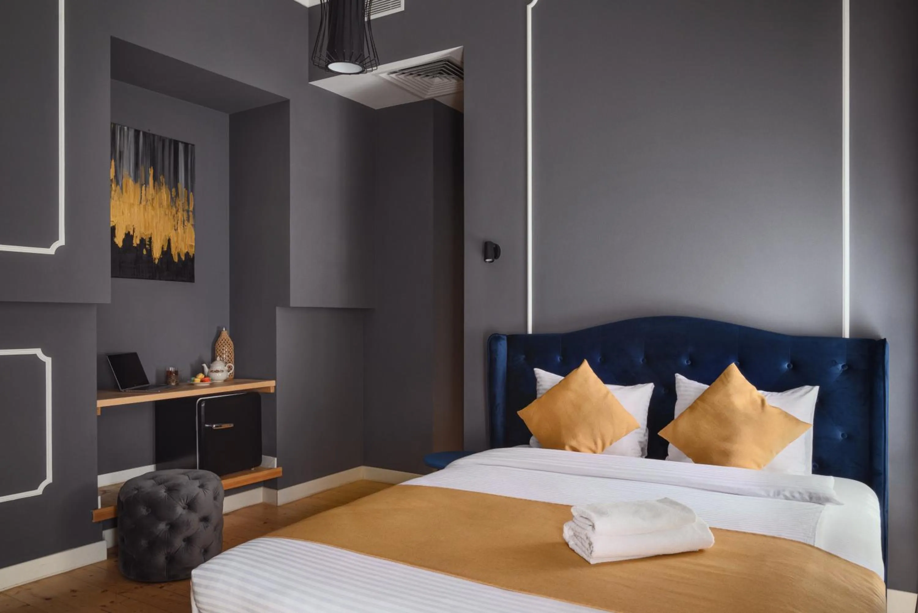 Bed in Blue Balcony Hotel