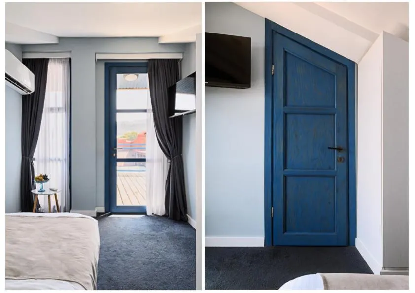 Bed in Blue Balcony Hotel