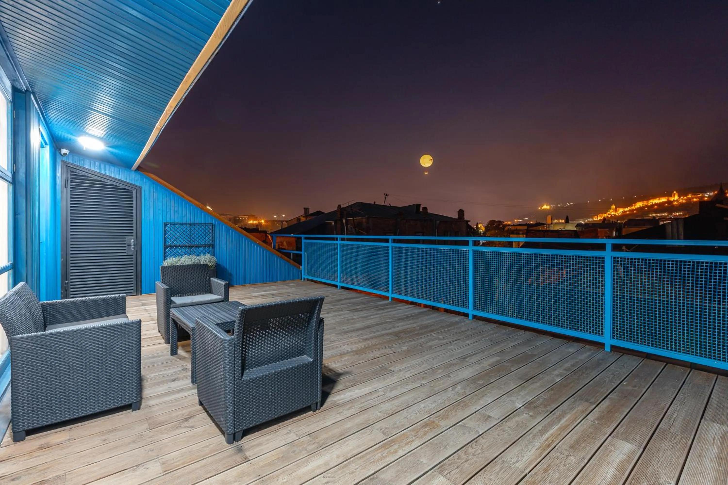 Night in Blue Balcony Hotel