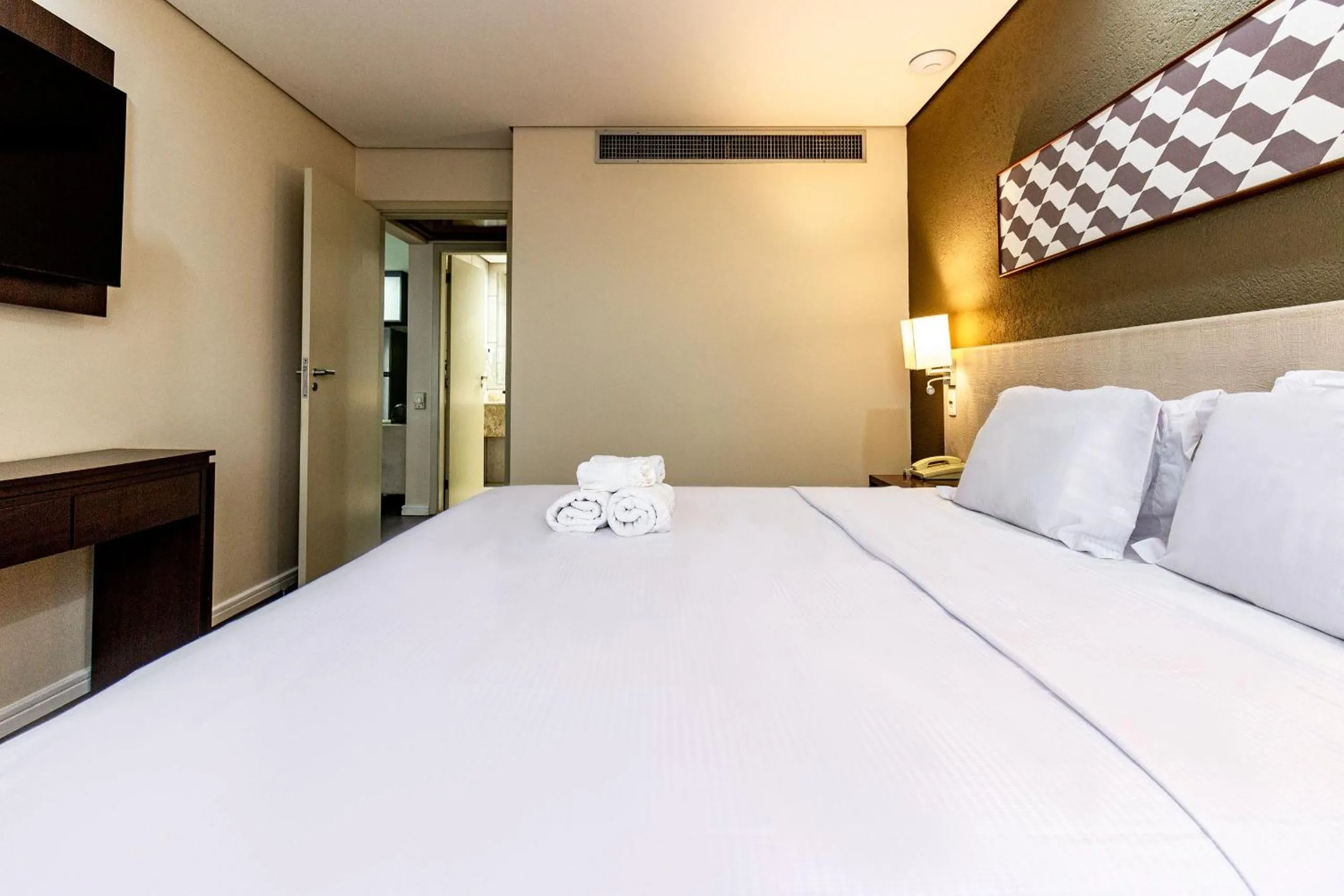 Bedroom, Bed in Xtay São Paulo Berrini - Apartamentos completos a 7min do metrô Berrini