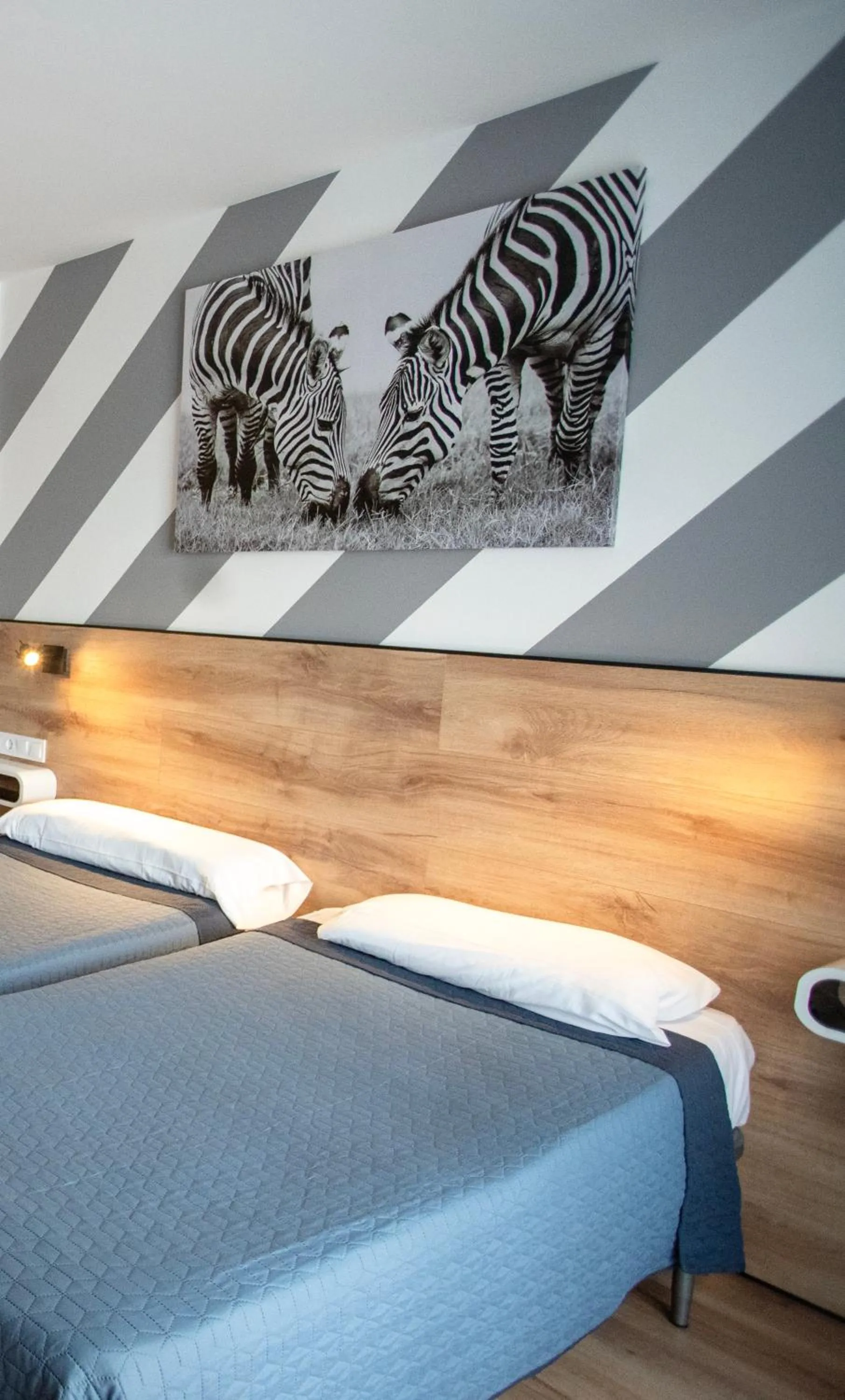 Bed in Hotel Ridomar 365