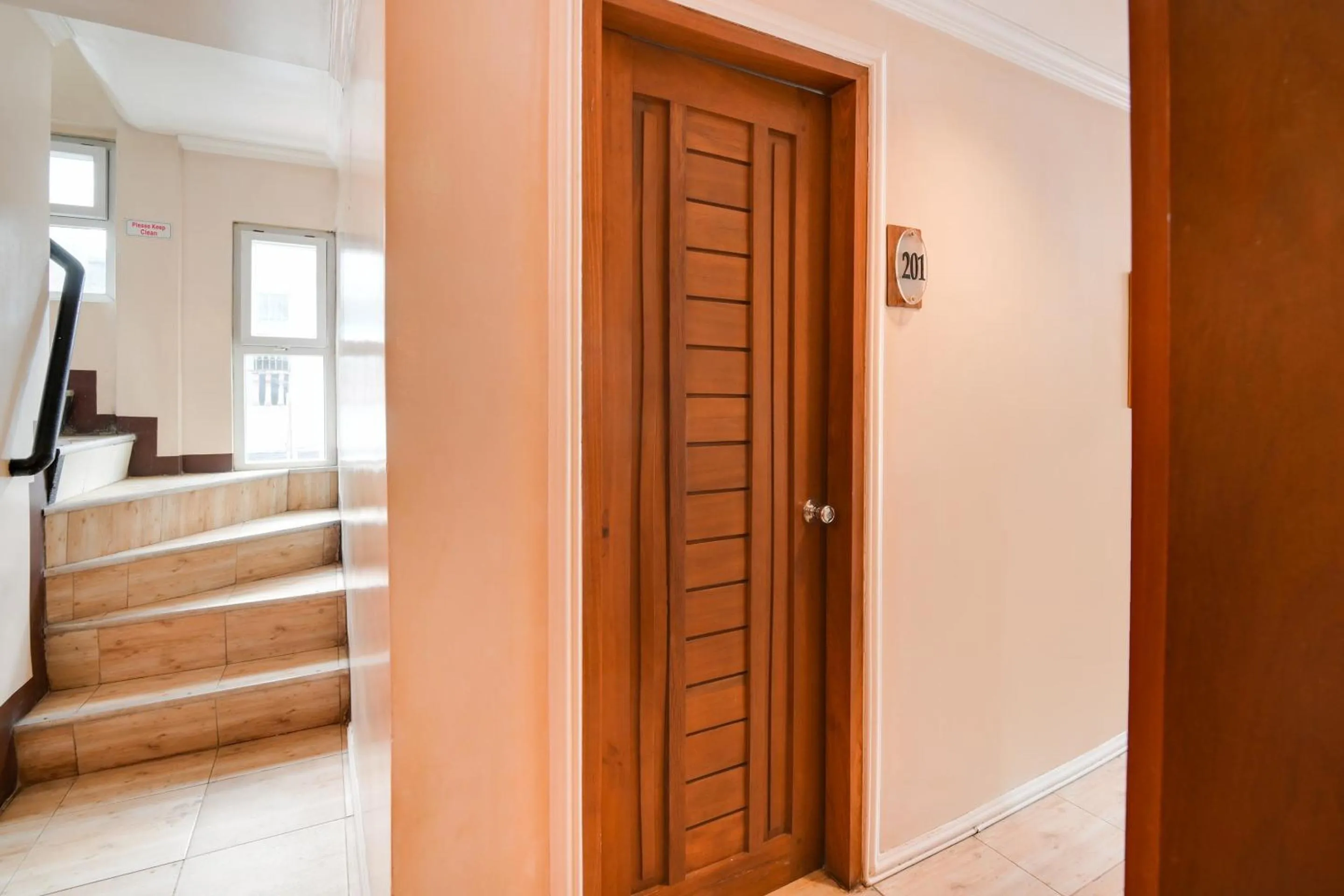 Bedroom in OYO 912 Fb Suites