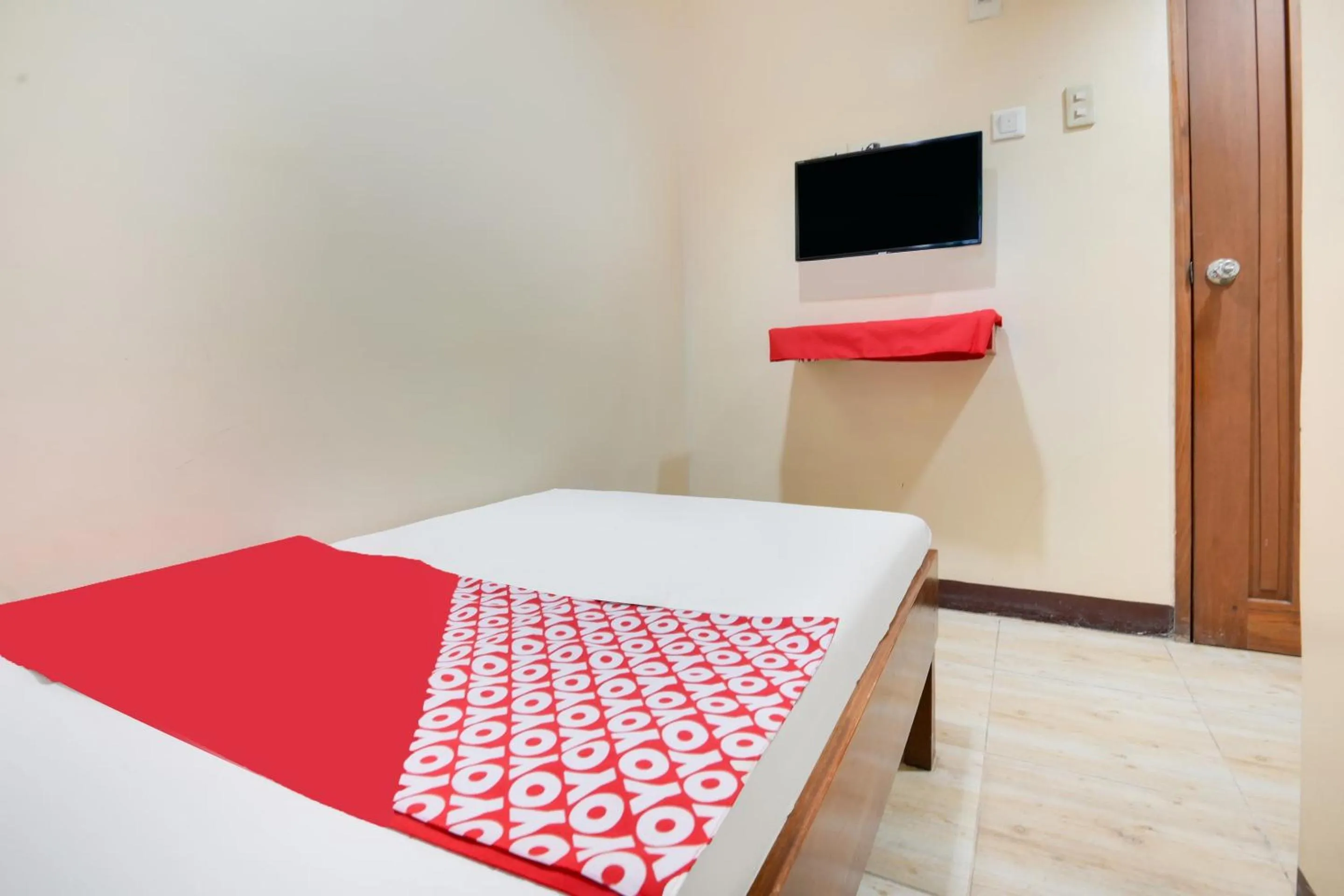 Bedroom in OYO 912 Fb Suites