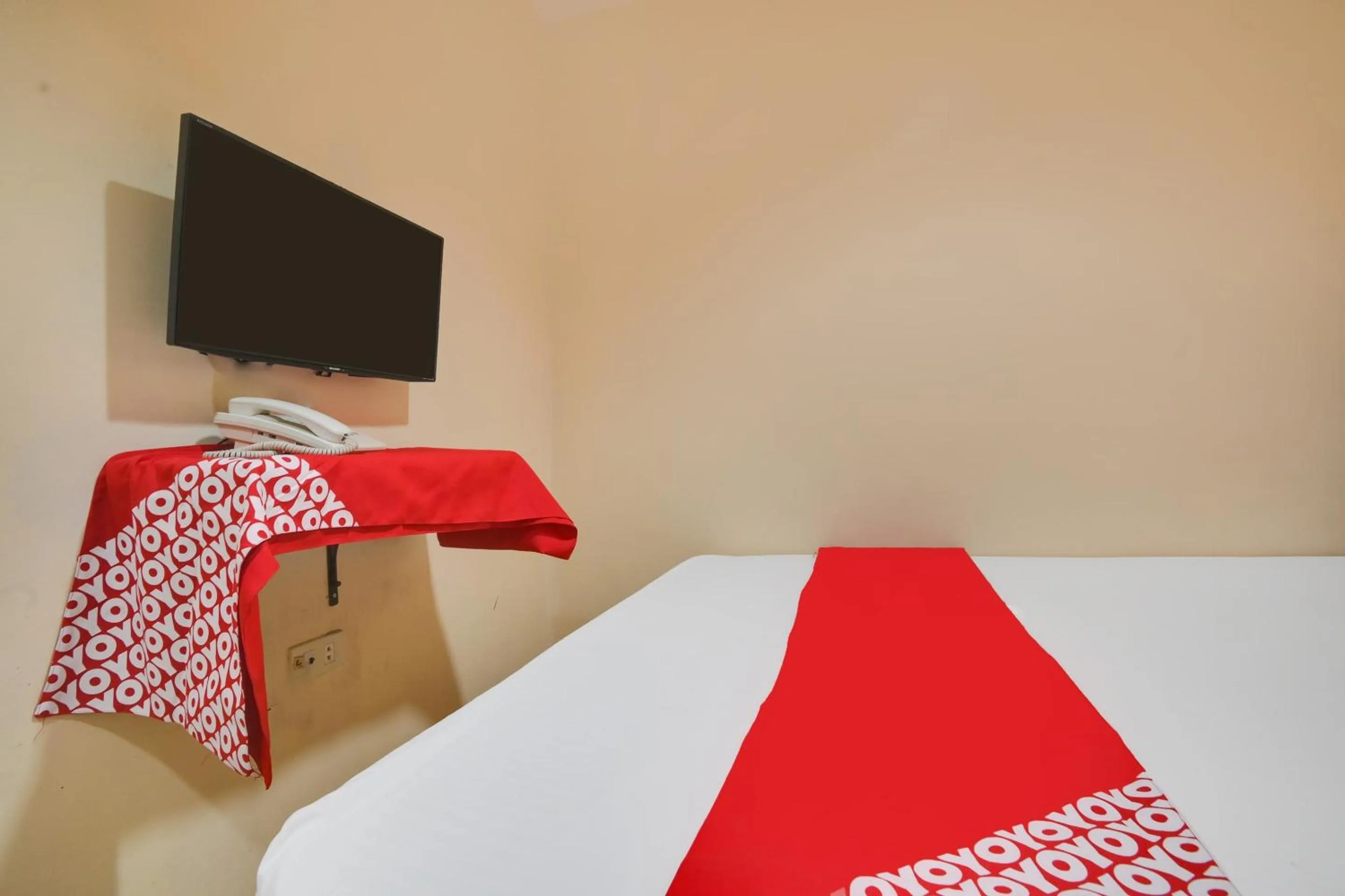 Bedroom in OYO 912 Fb Suites