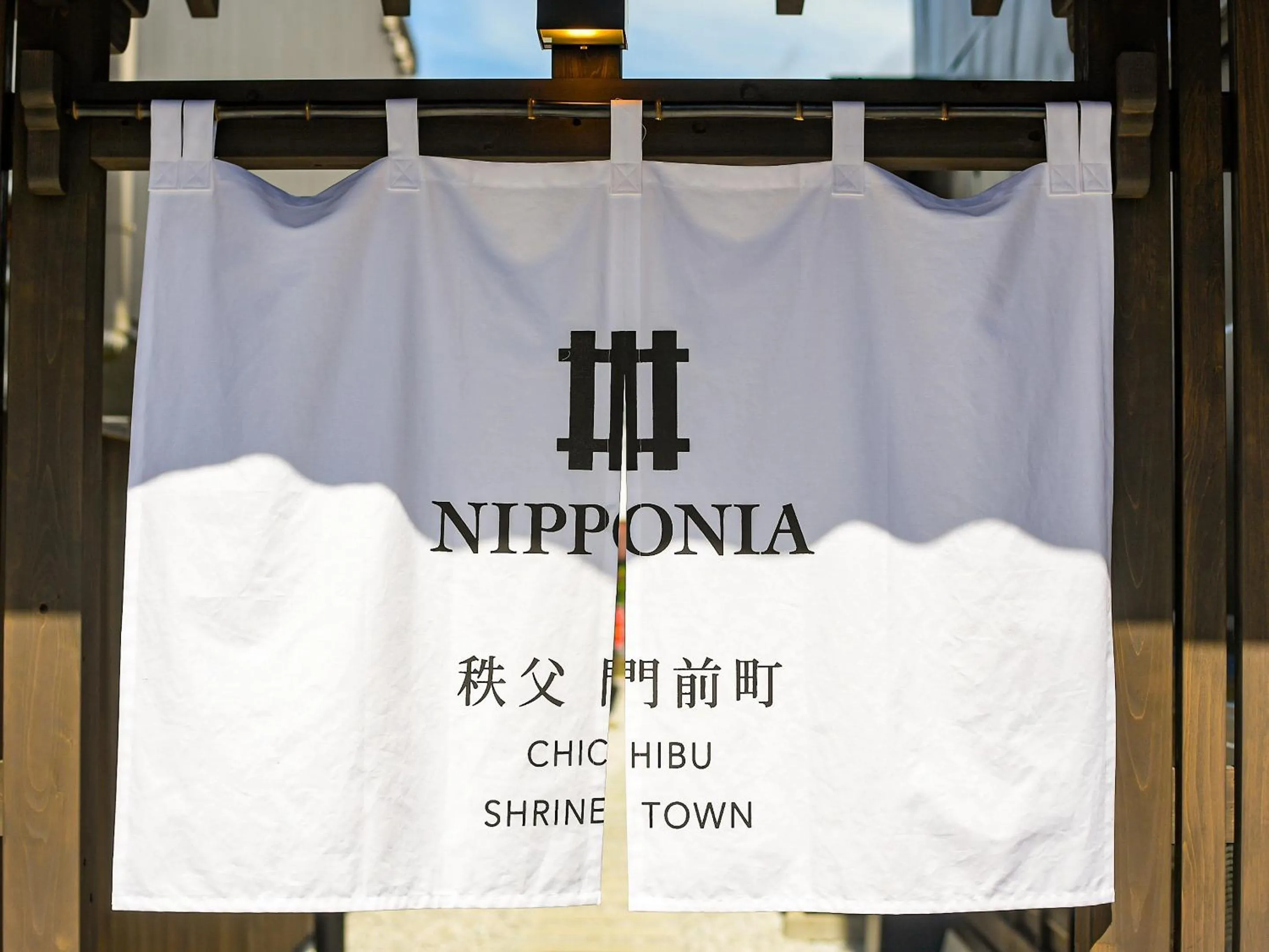 Property logo or sign in NIPPONIA Chichibu Monzenmachi