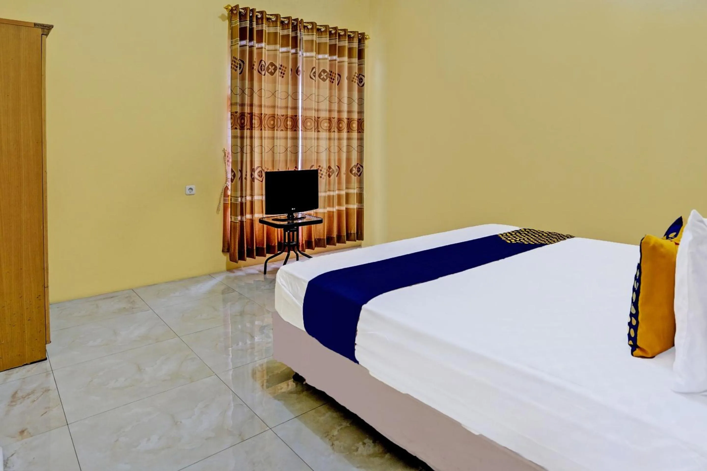 Bedroom in Hotel O Raffa Residence Syariah