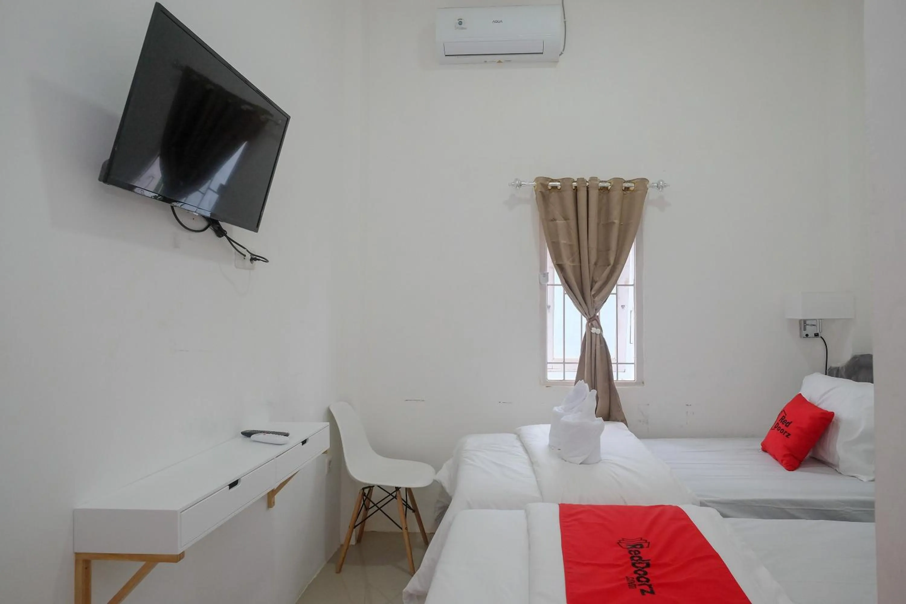 Bed in RedDoorz Plus At Lovina Inn Tonrangeng River Side