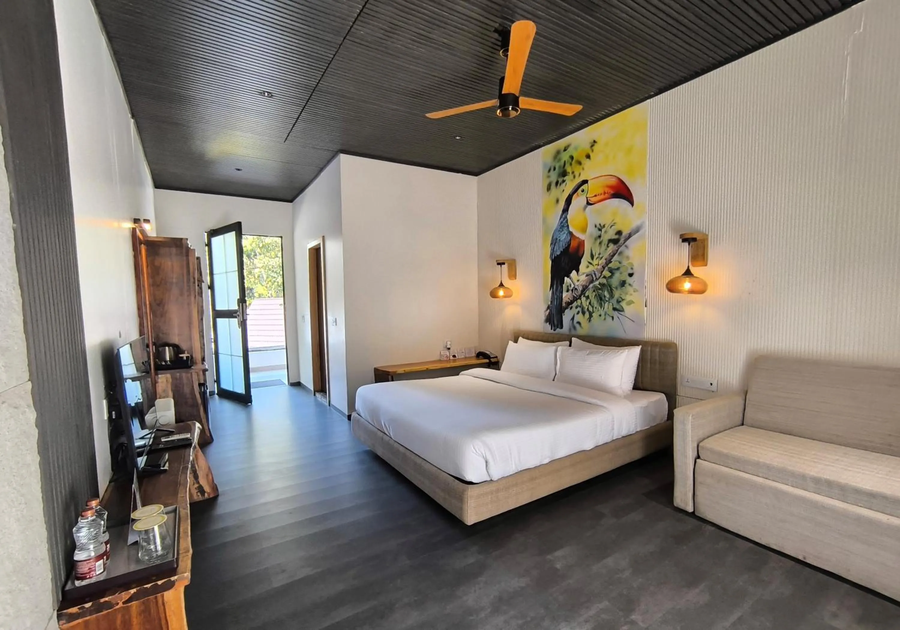 Bed in WelcomHeritage Tarangi Ramganga Resort