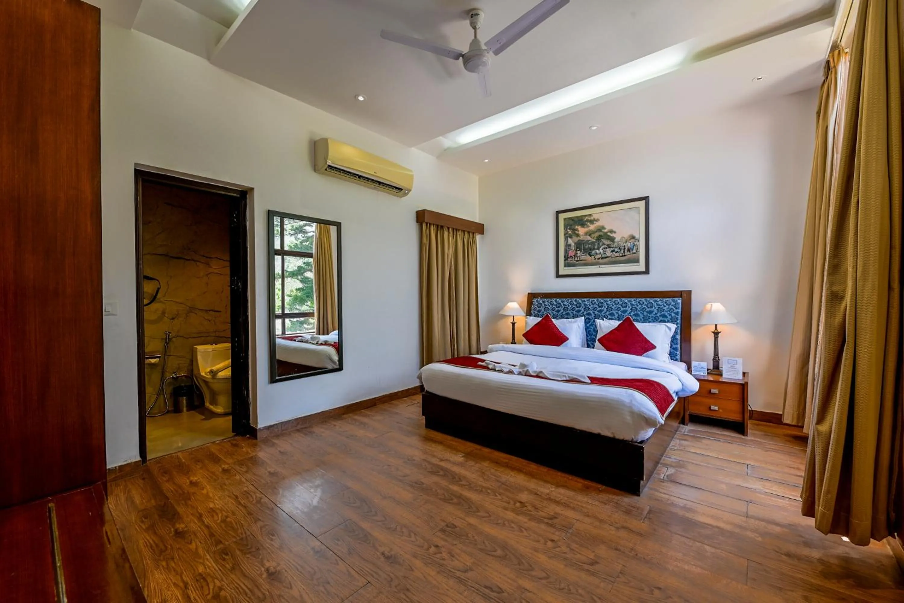 Bed in WelcomHeritage Tarangi Ramganga Resort