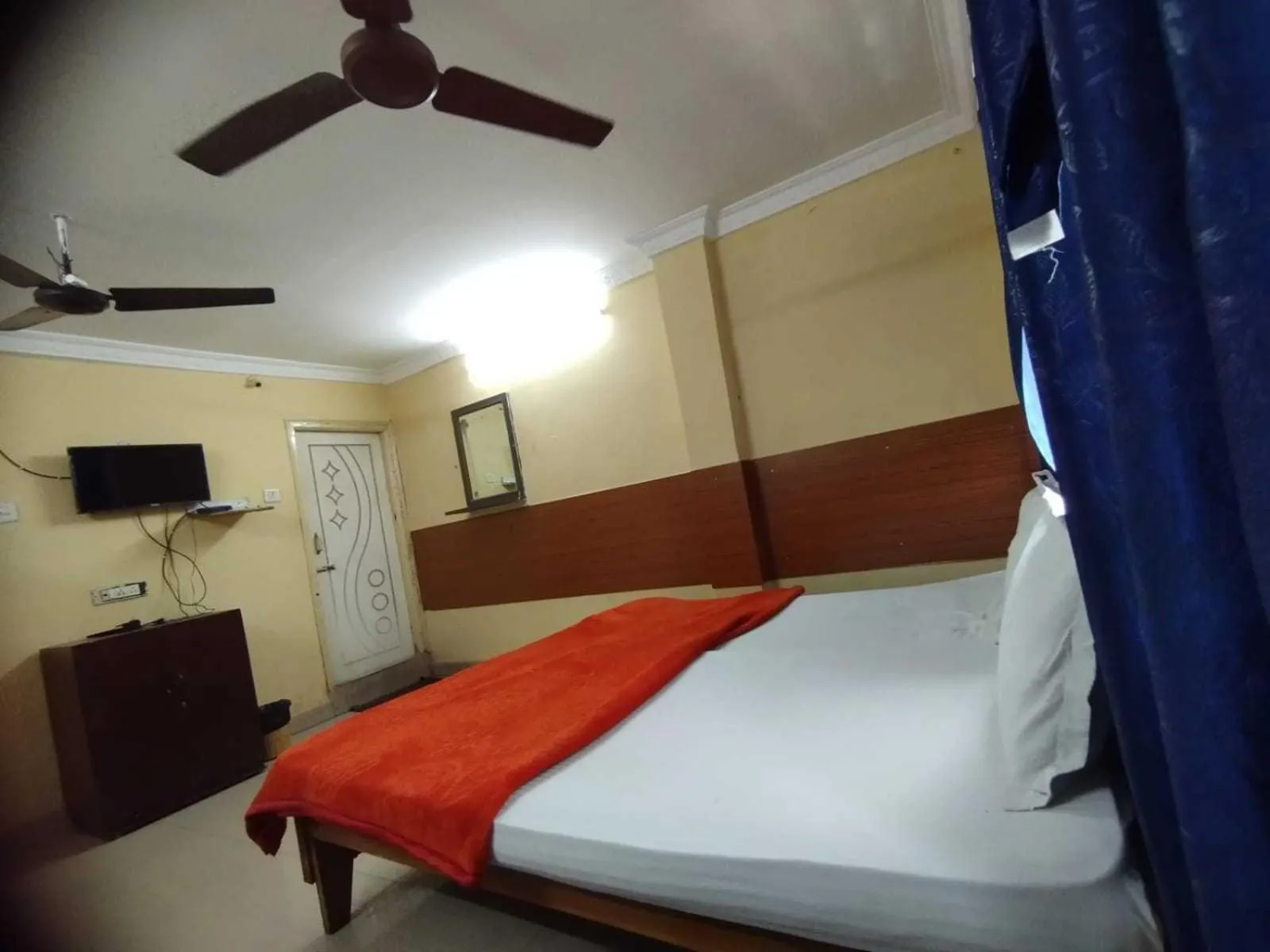 Bedroom in SPOT ON Hotel Akshaya Residency Near Bbr Super Speciality Hospital