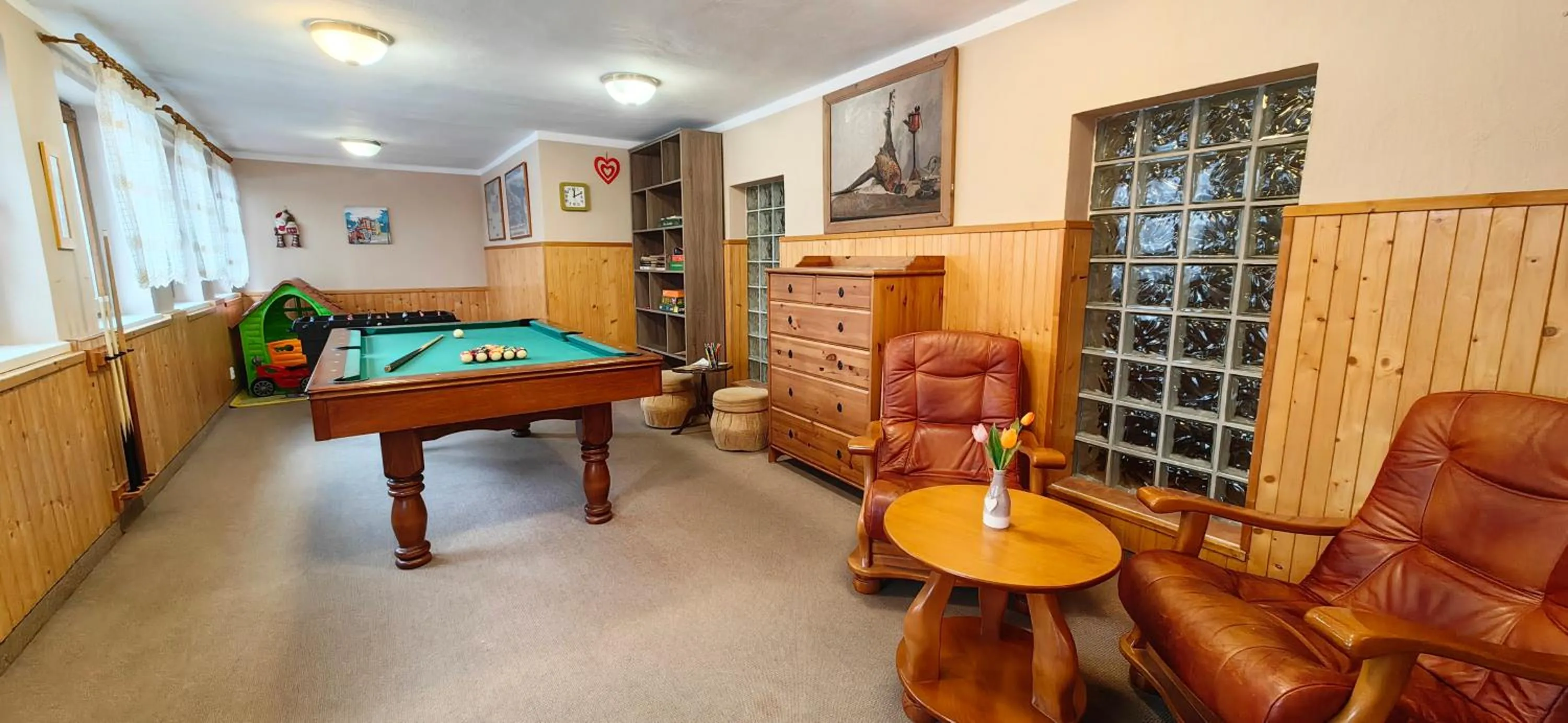 Communal lounge/ TV room in Jurika Liptov