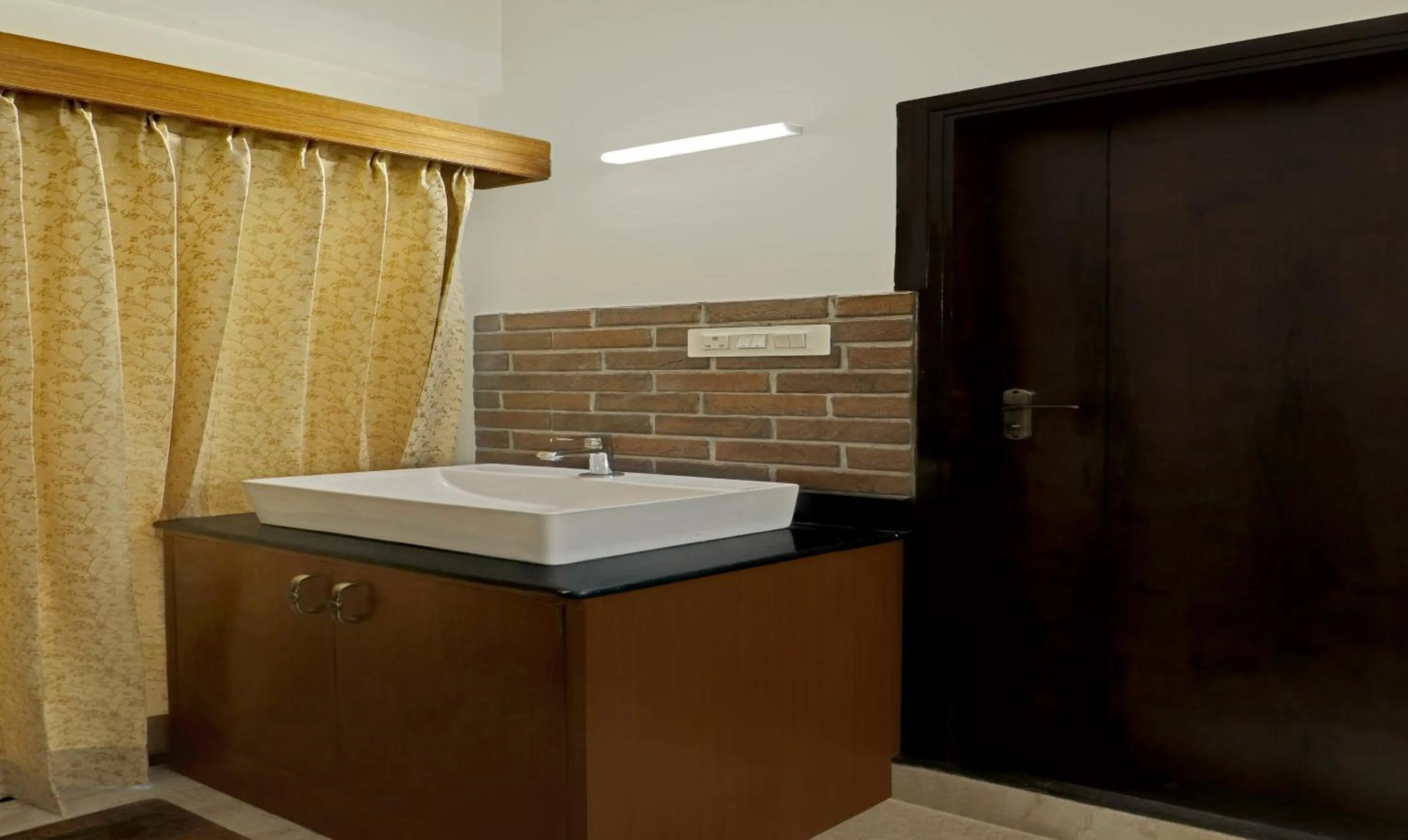 Bathroom in Treebo Celebrity Hotels And Suites