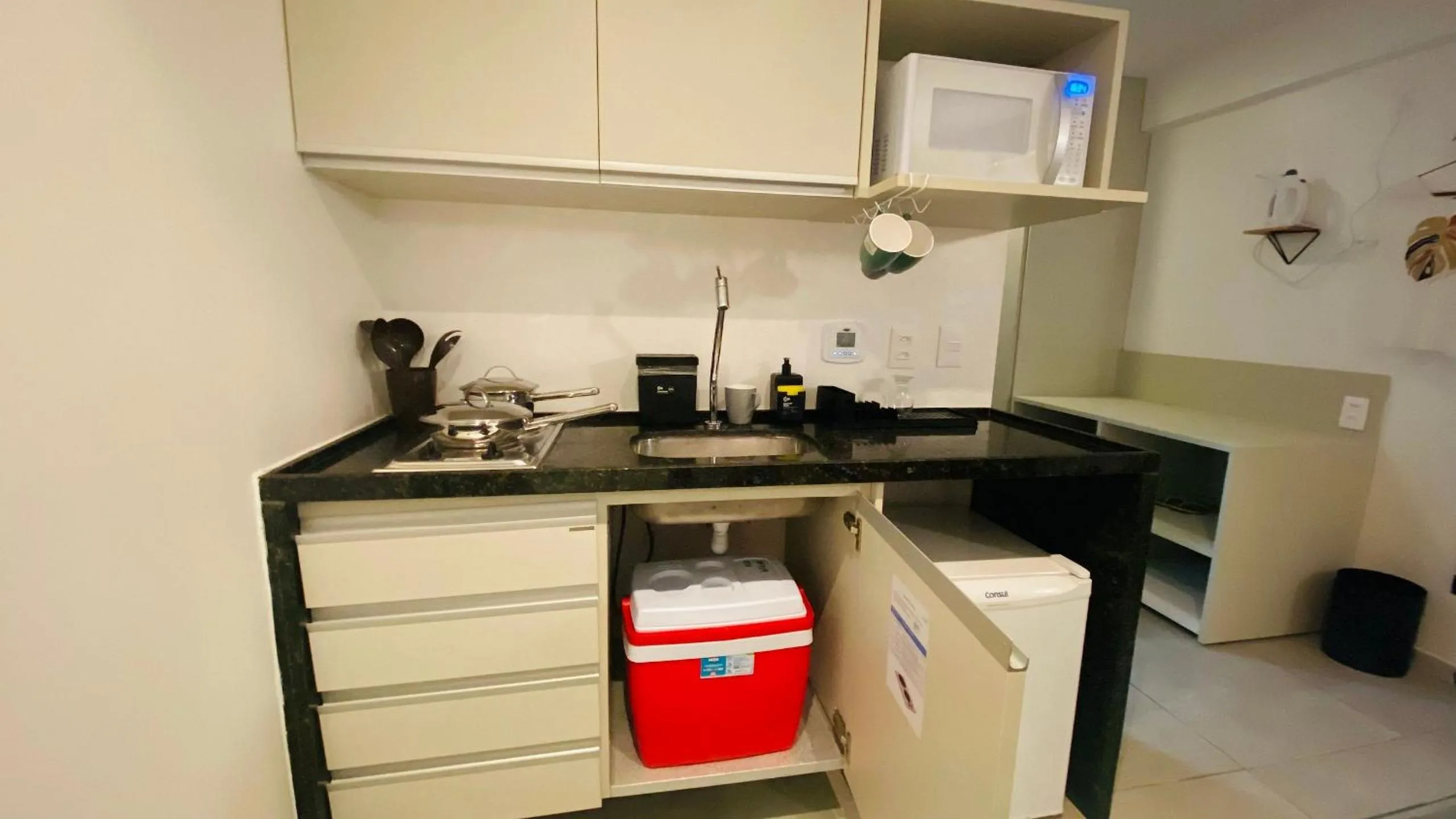 Kitchen or kitchenette in Ritz Suítes-Maceió, Flat a Beira mar de temporada