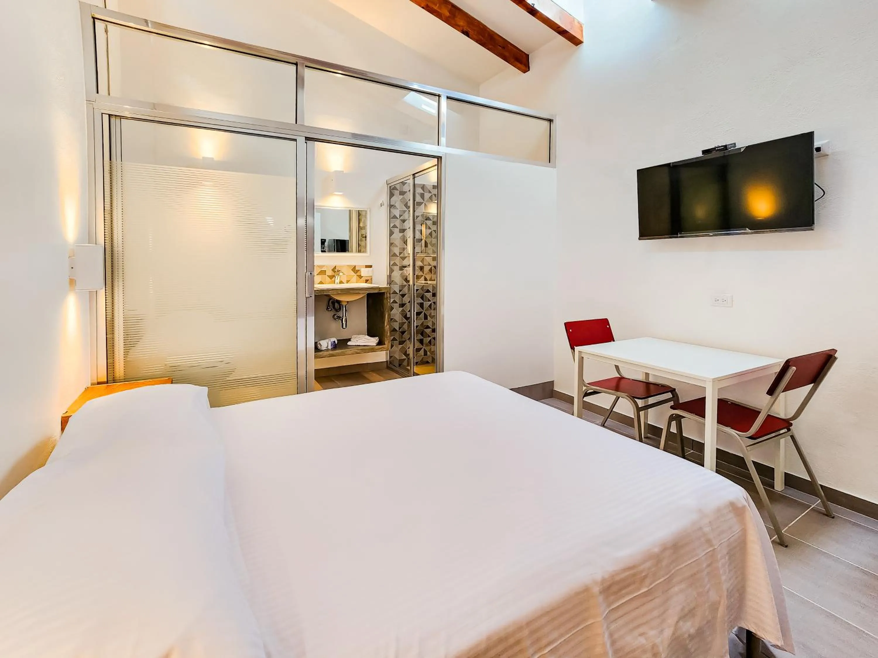 Bed in Niebla Suites