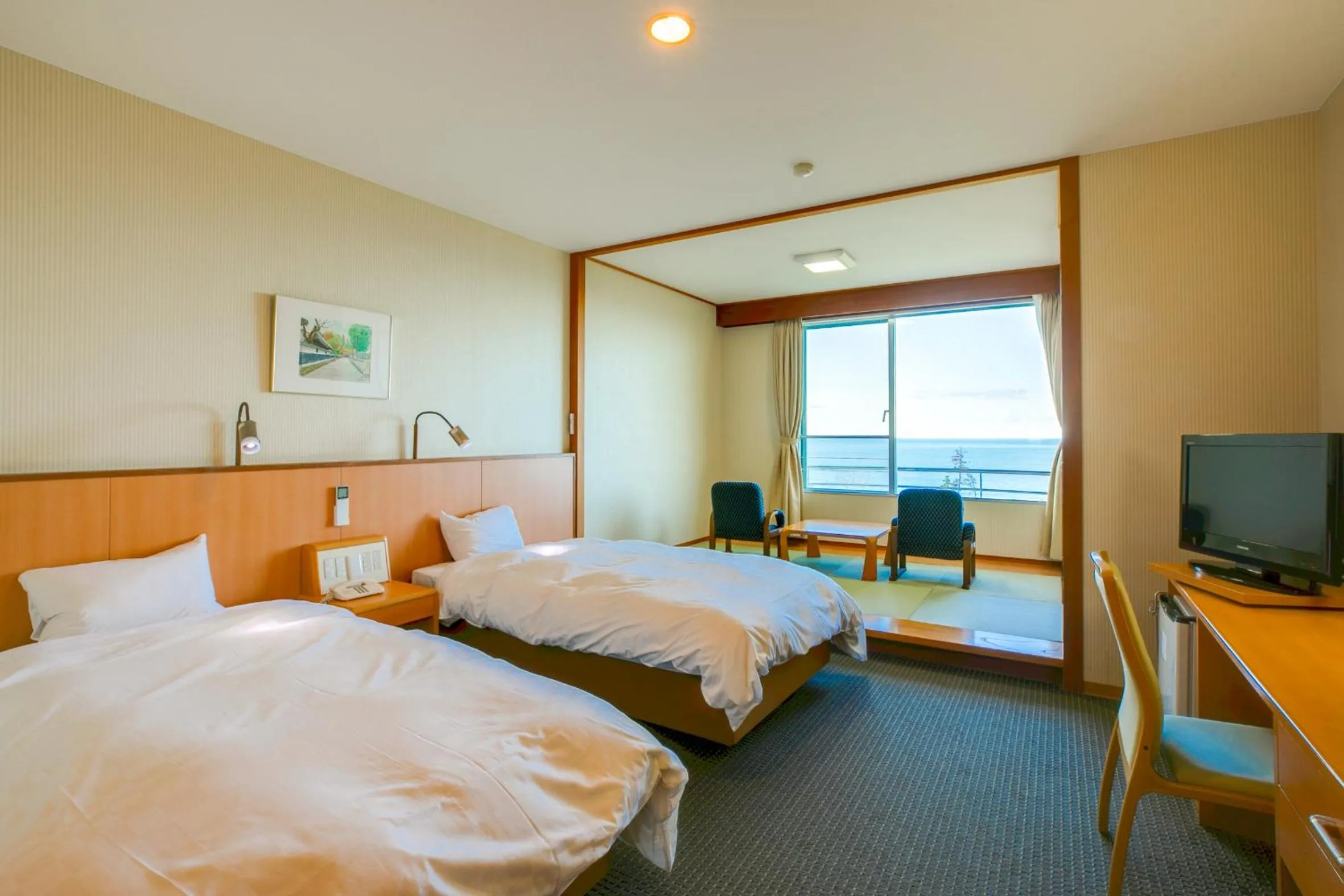 Twin Room with Tatami Area and Shared Bathroom - single occupancy in Kyukamura Echizen-Mikuni