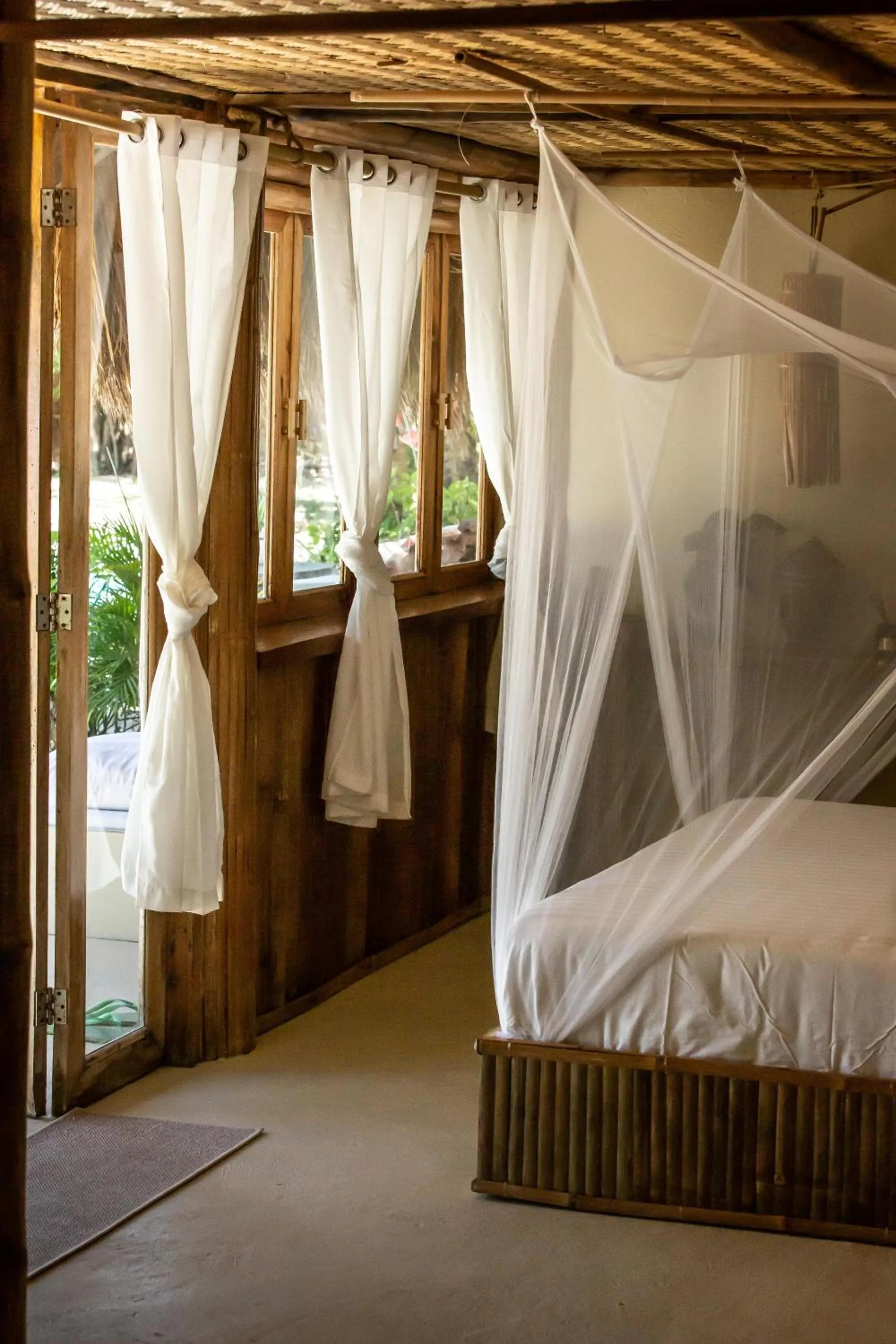 Bed in The Beach House Ocam Ocam