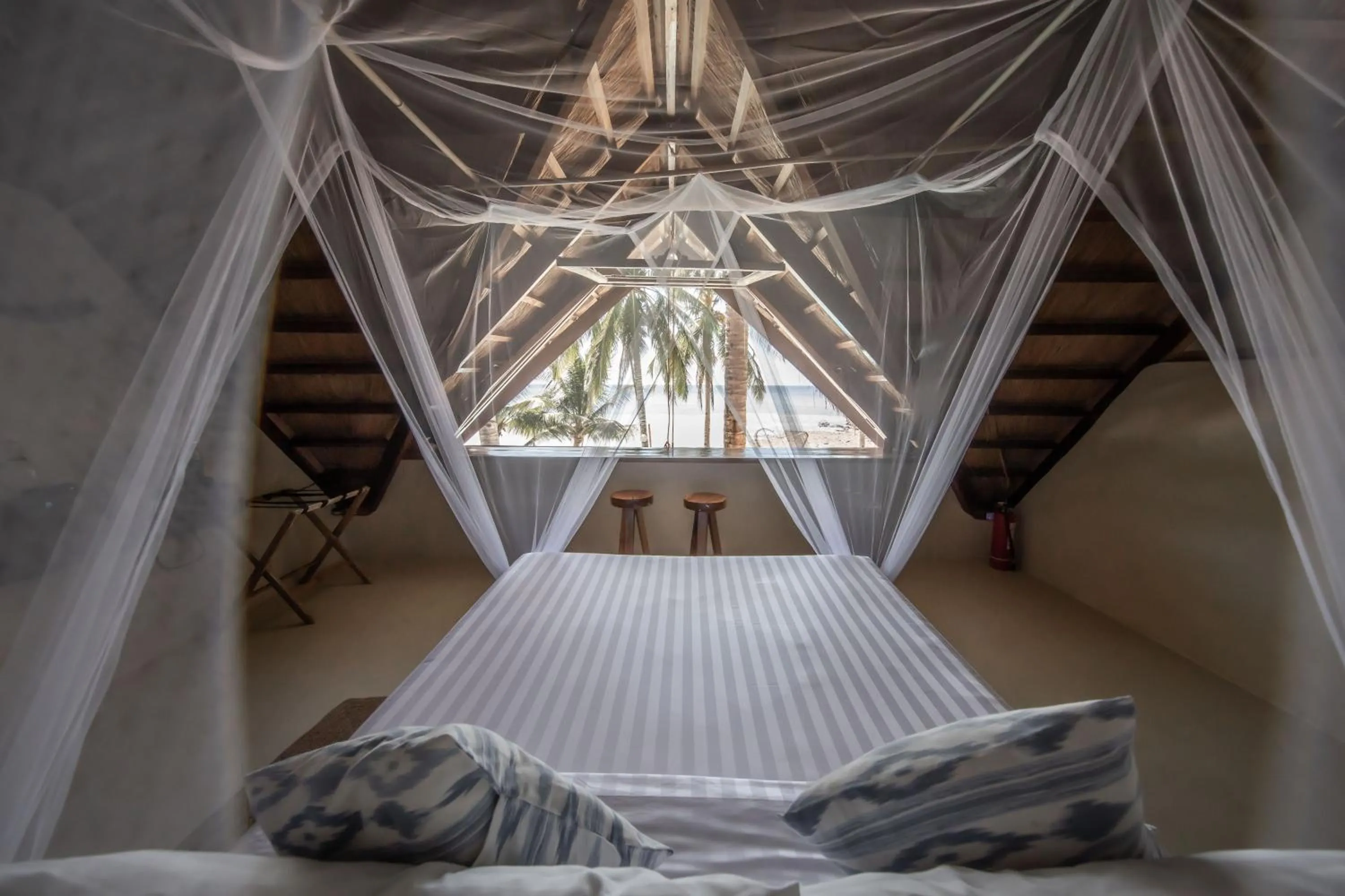 Bed in The Beach House Ocam Ocam