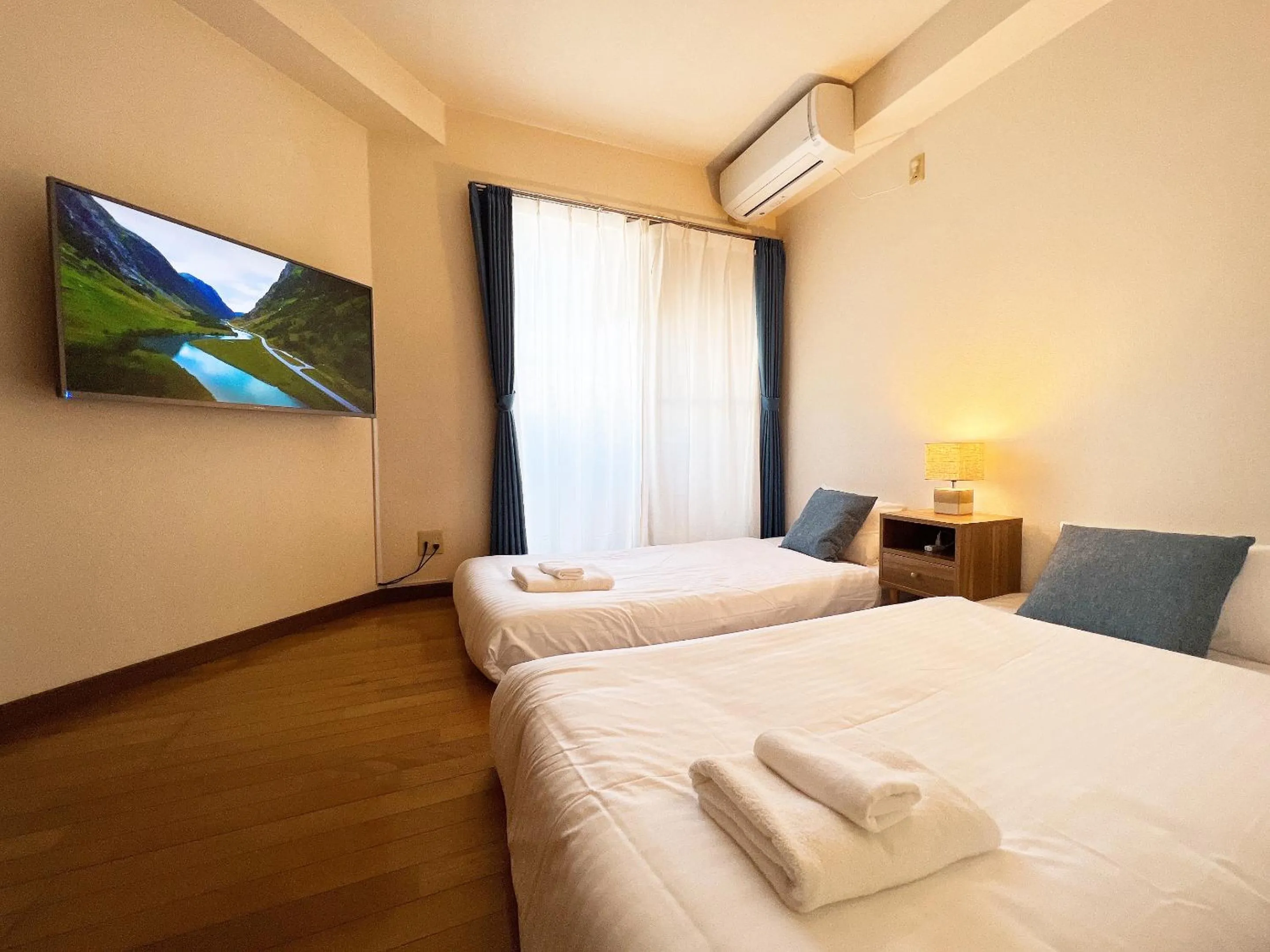 Bed in PINE TREE HOTEL