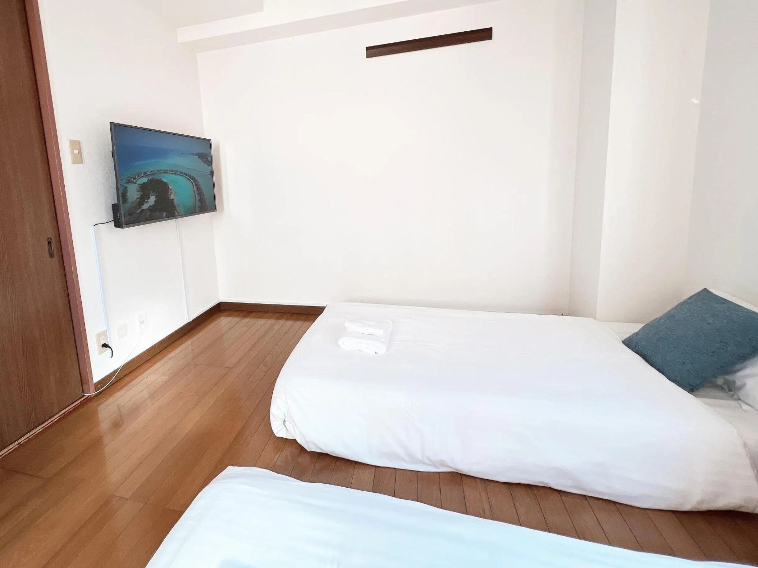 Bed in PINE TREE HOTEL