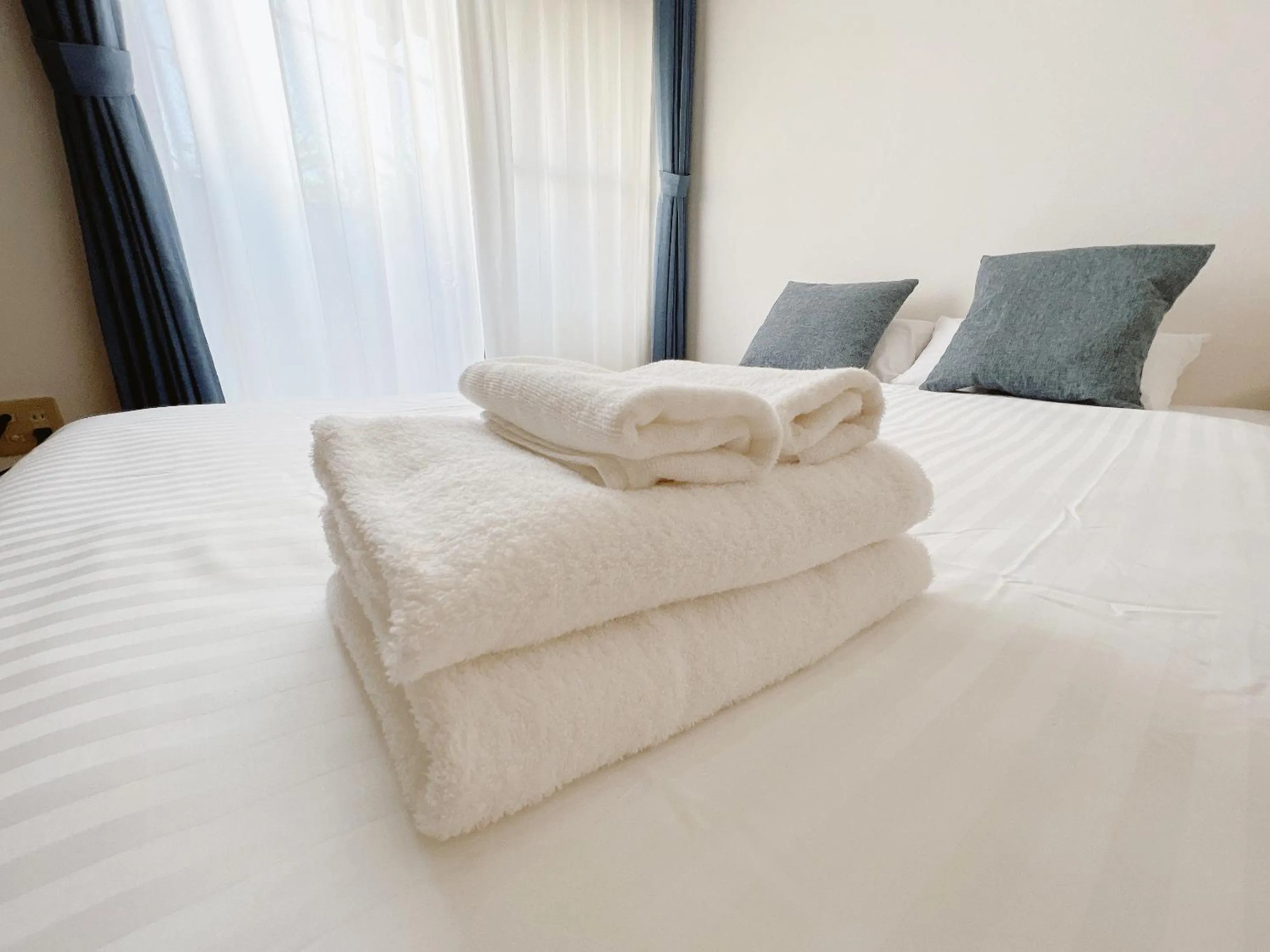 Bed in PINE TREE HOTEL