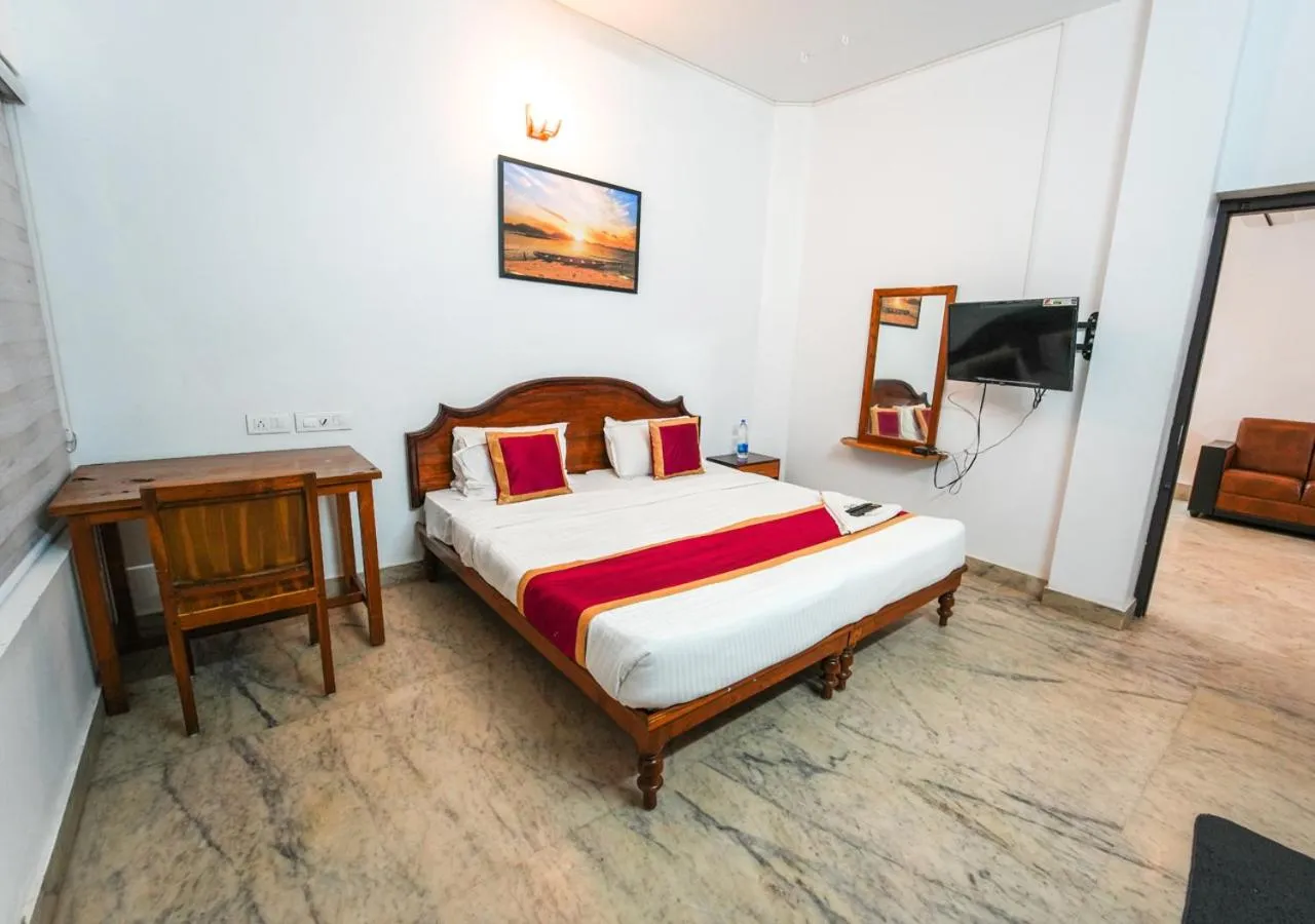 TV and multimedia, Bed in Pop Tavern Kovalam Beach Villa by VOYE HOMES