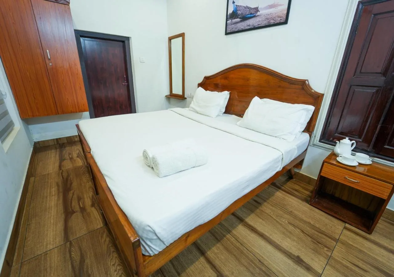 Photo of the whole room, Bed in Pop Tavern Kovalam Beach Villa by VOYE HOMES