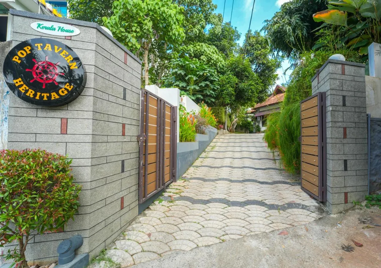 Facade/entrance in Pop Tavern Kovalam Beach Villa by VOYE HOMES