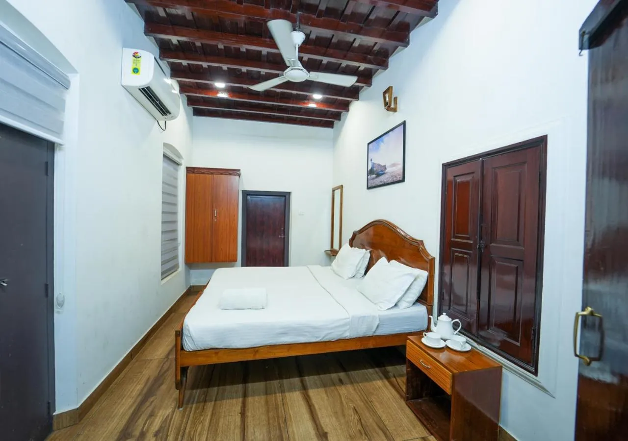 Photo of the whole room, Bed in Pop Tavern Kovalam Beach Villa by VOYE HOMES