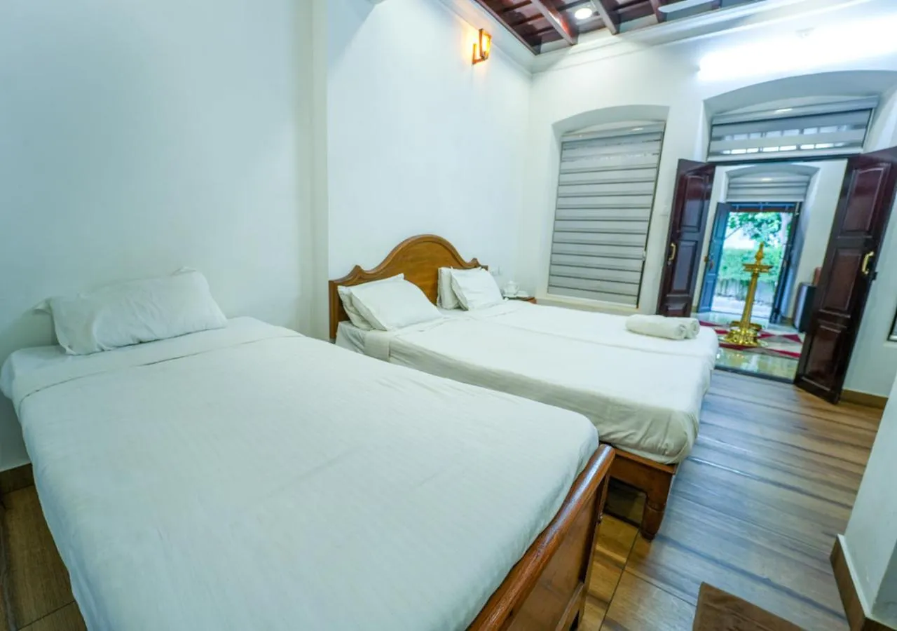 Photo of the whole room, Bed in Pop Tavern Kovalam Beach Villa by VOYE HOMES