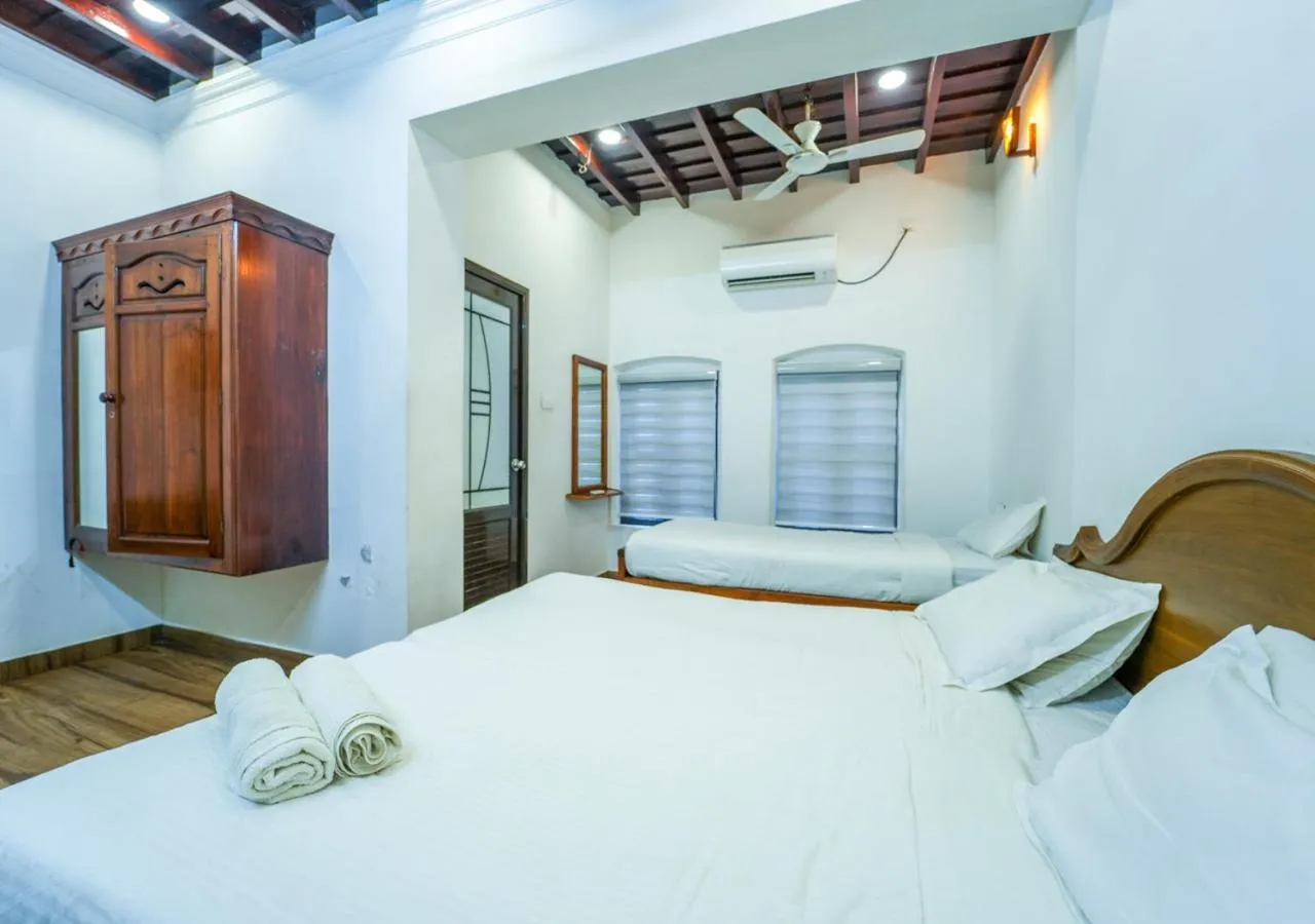 Photo of the whole room, Bed in Pop Tavern Kovalam Beach Villa by VOYE HOMES