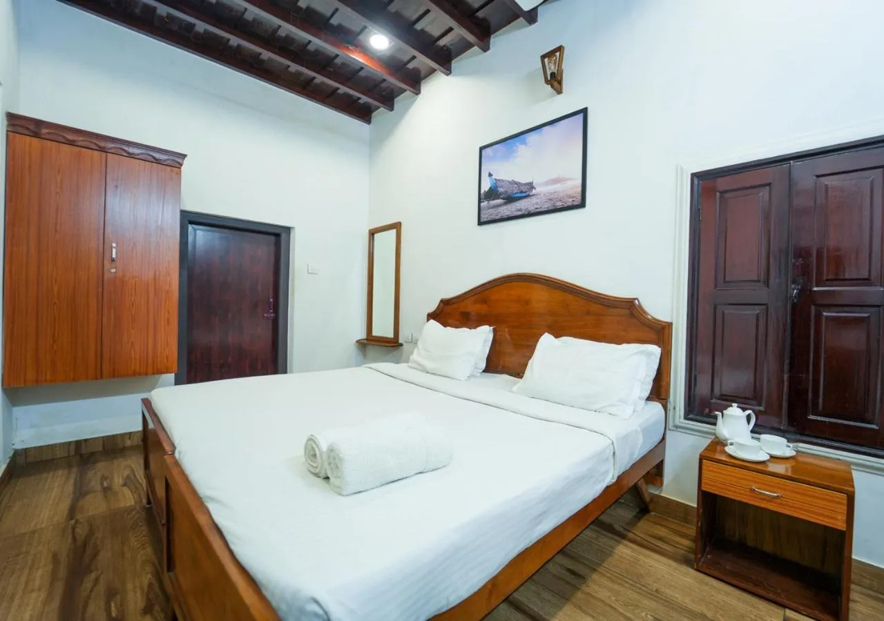 Photo of the whole room, Bed in Pop Tavern Kovalam Beach Villa by VOYE HOMES