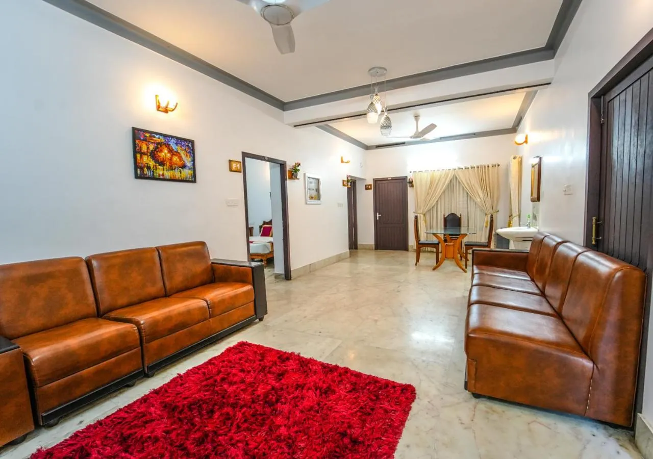 Living room in Pop Tavern Kovalam Beach Villa by VOYE HOMES