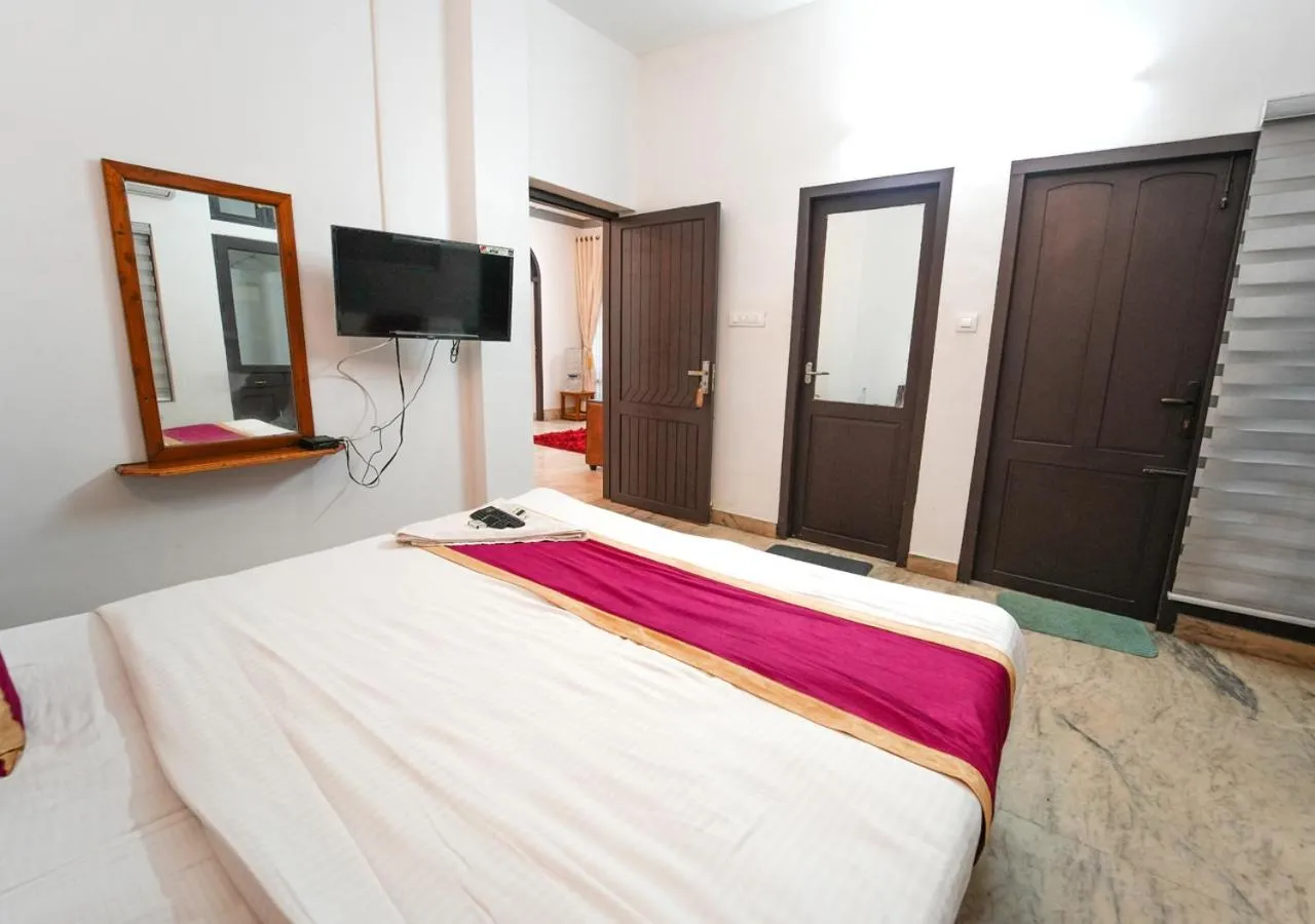 Photo of the whole room, Bed in Pop Tavern Kovalam Beach Villa by VOYE HOMES