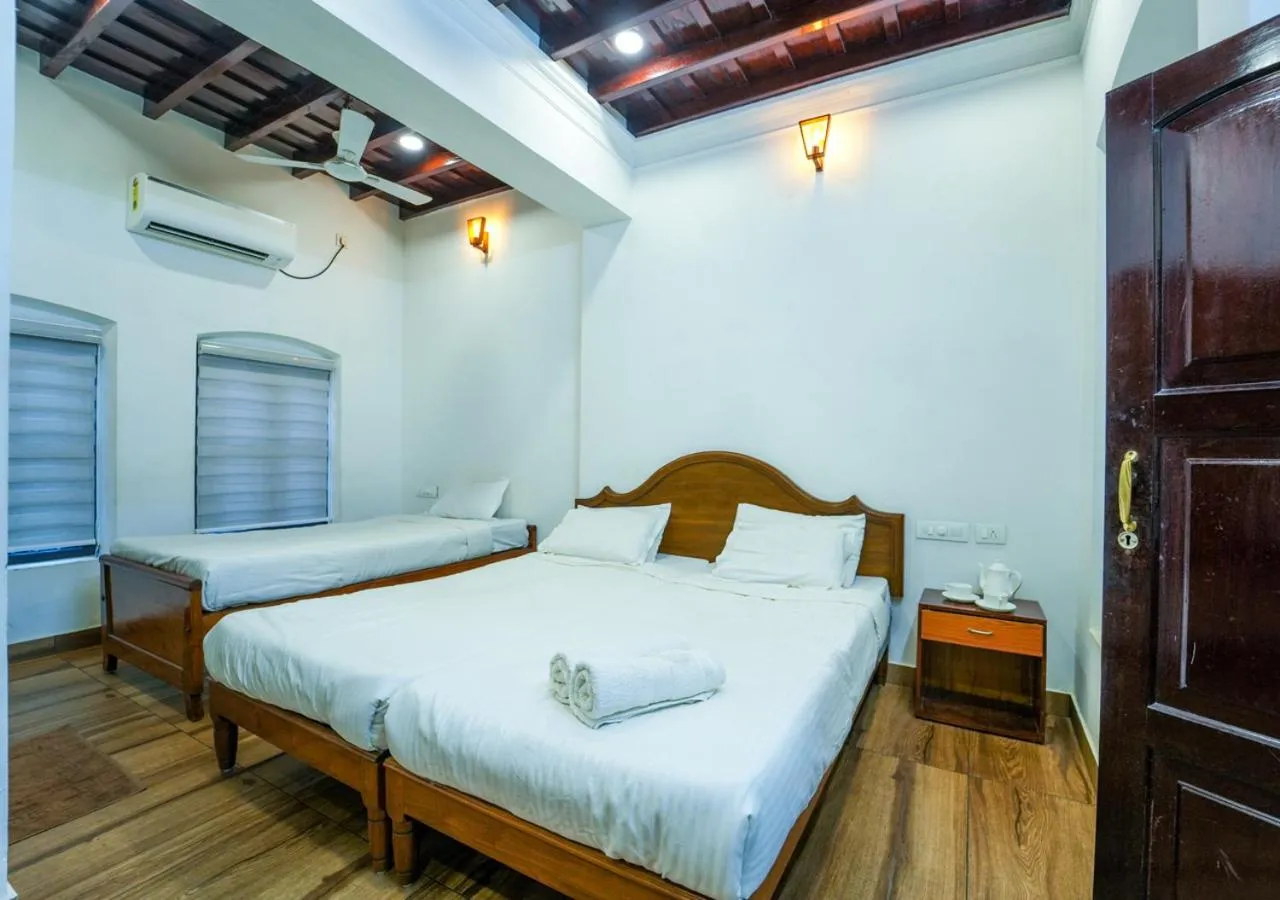 Photo of the whole room, Bed in Pop Tavern Kovalam Beach Villa by VOYE HOMES