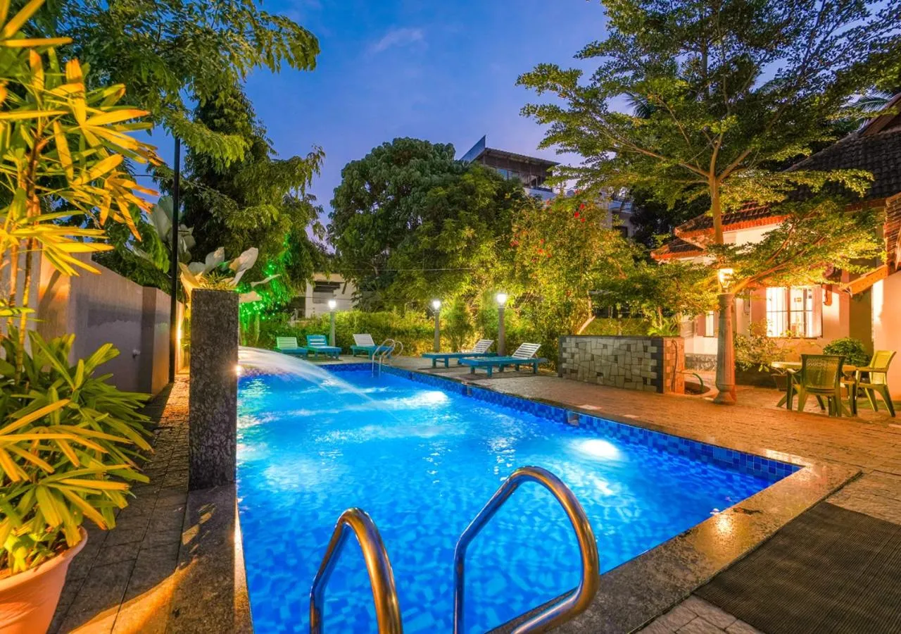 Swimming pool in Pop Tavern Kovalam Beach Villa by VOYE HOMES