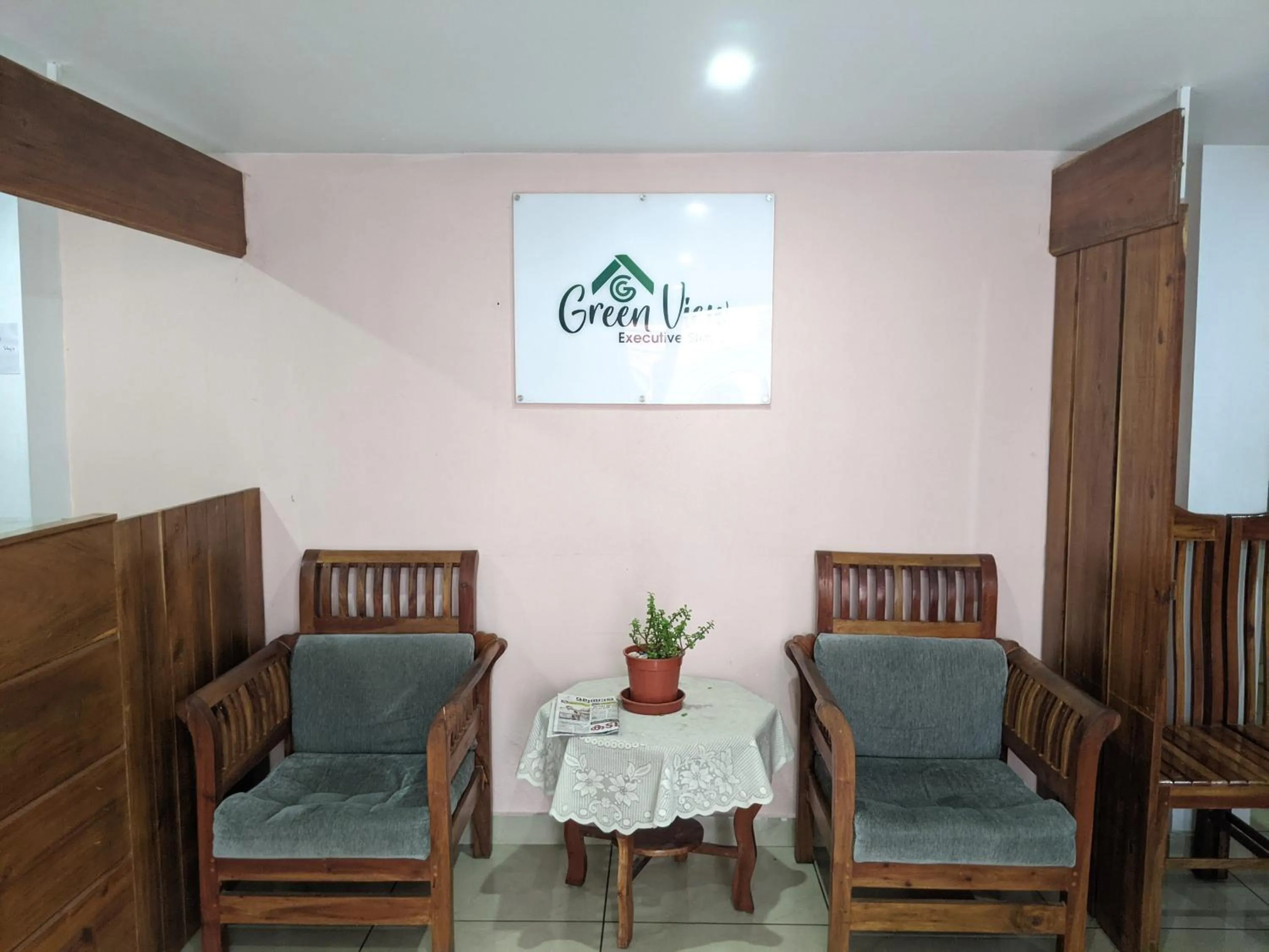 Seating area in Green View Executive Stay's