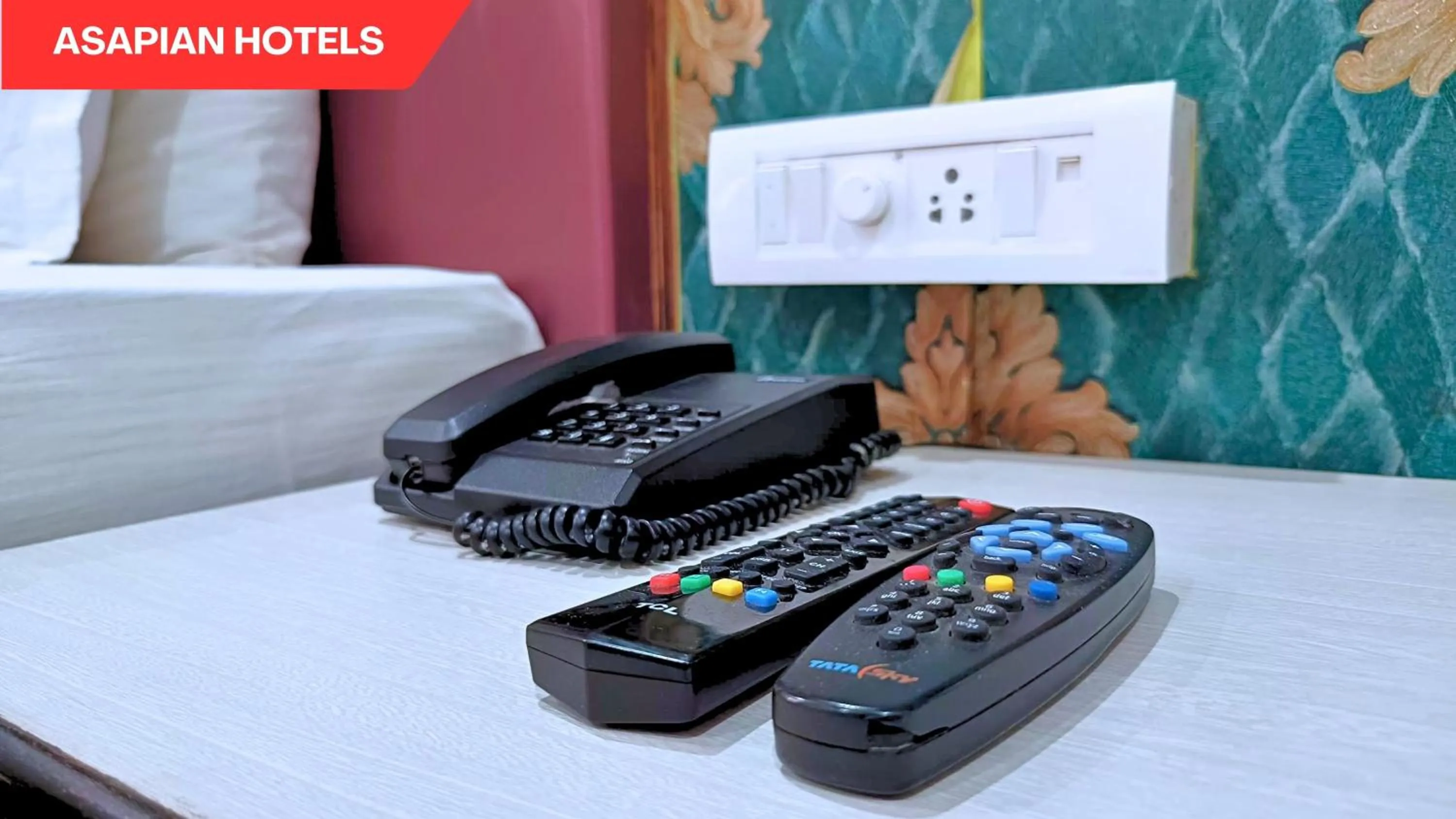 TV and multimedia in Hotel Vijay Deluxe