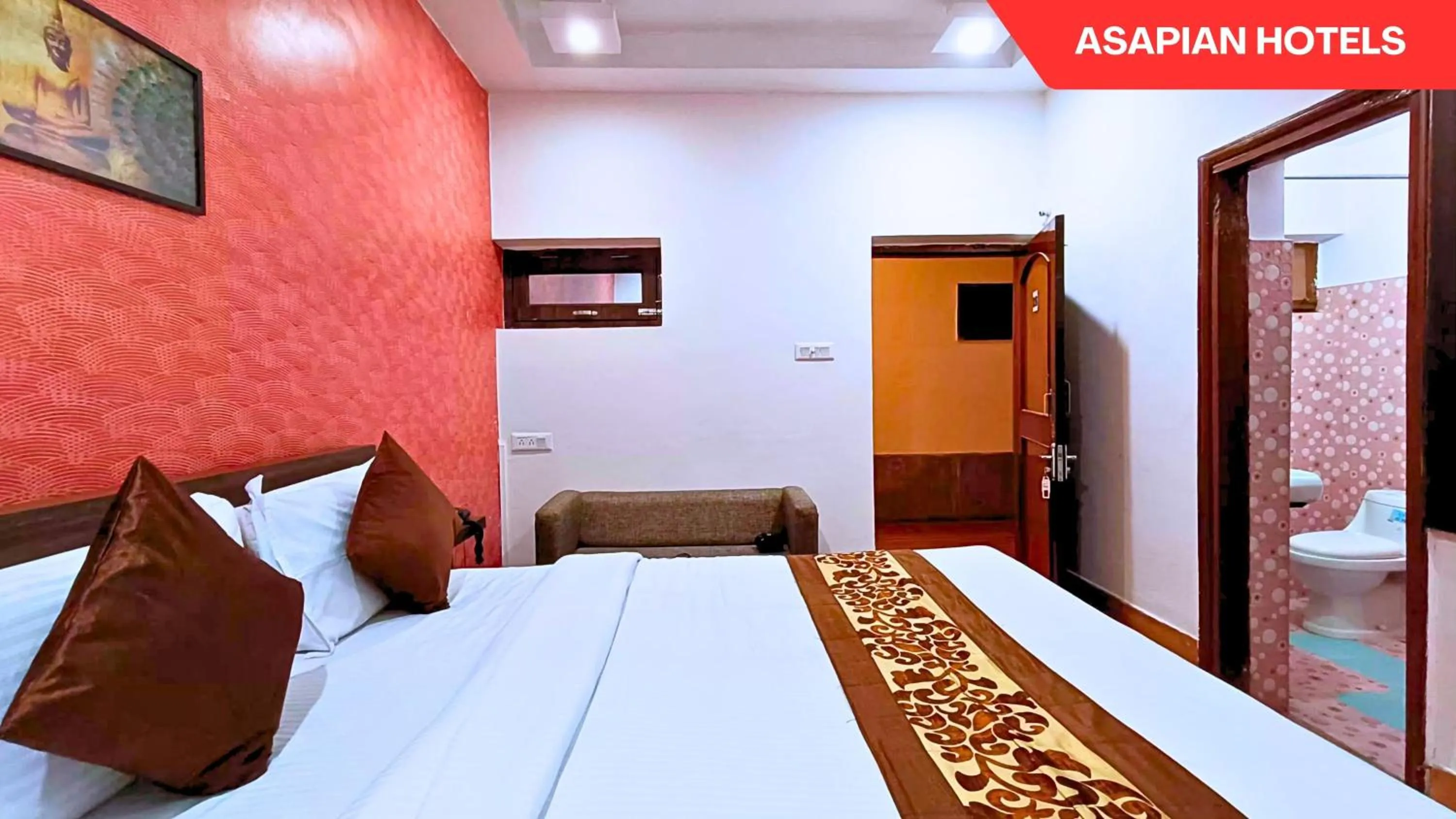 Bed in Hotel Vijay Deluxe