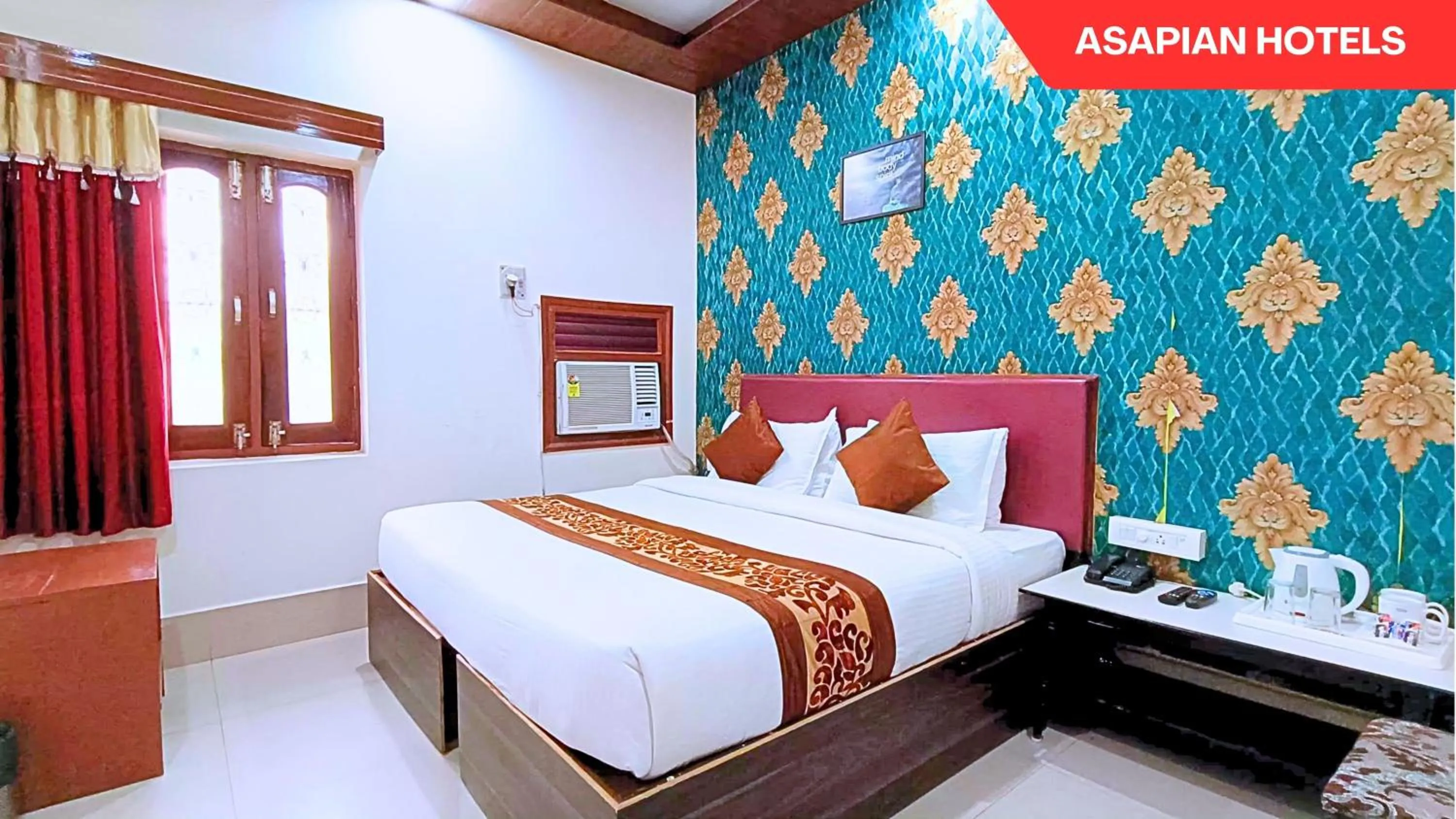 Bed in Hotel Vijay Deluxe