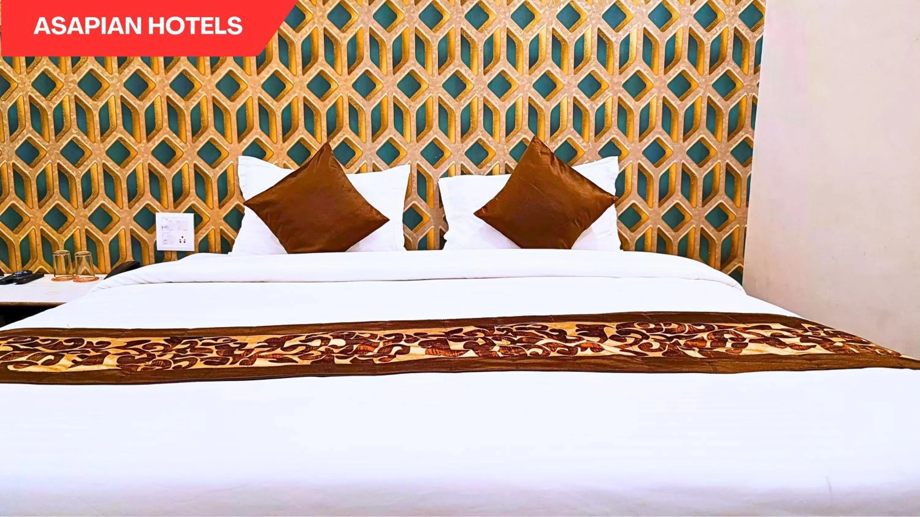 Bed in Hotel Vijay Deluxe