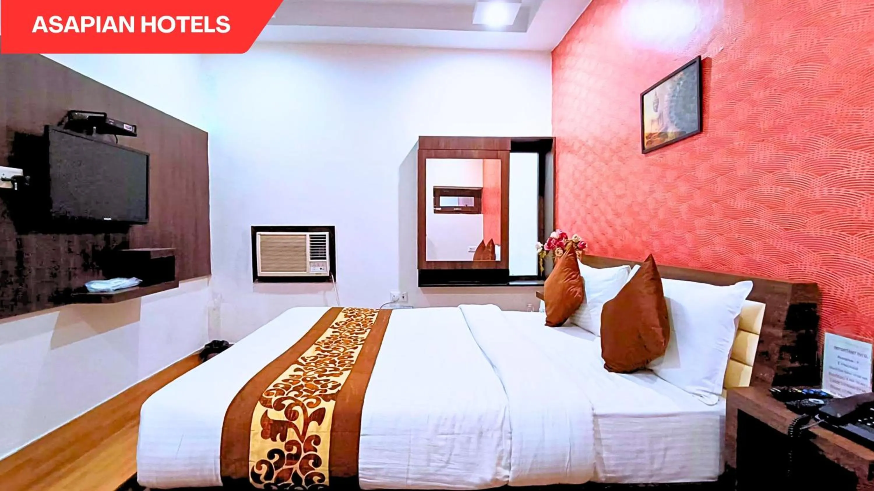 Bed in Hotel Vijay Deluxe