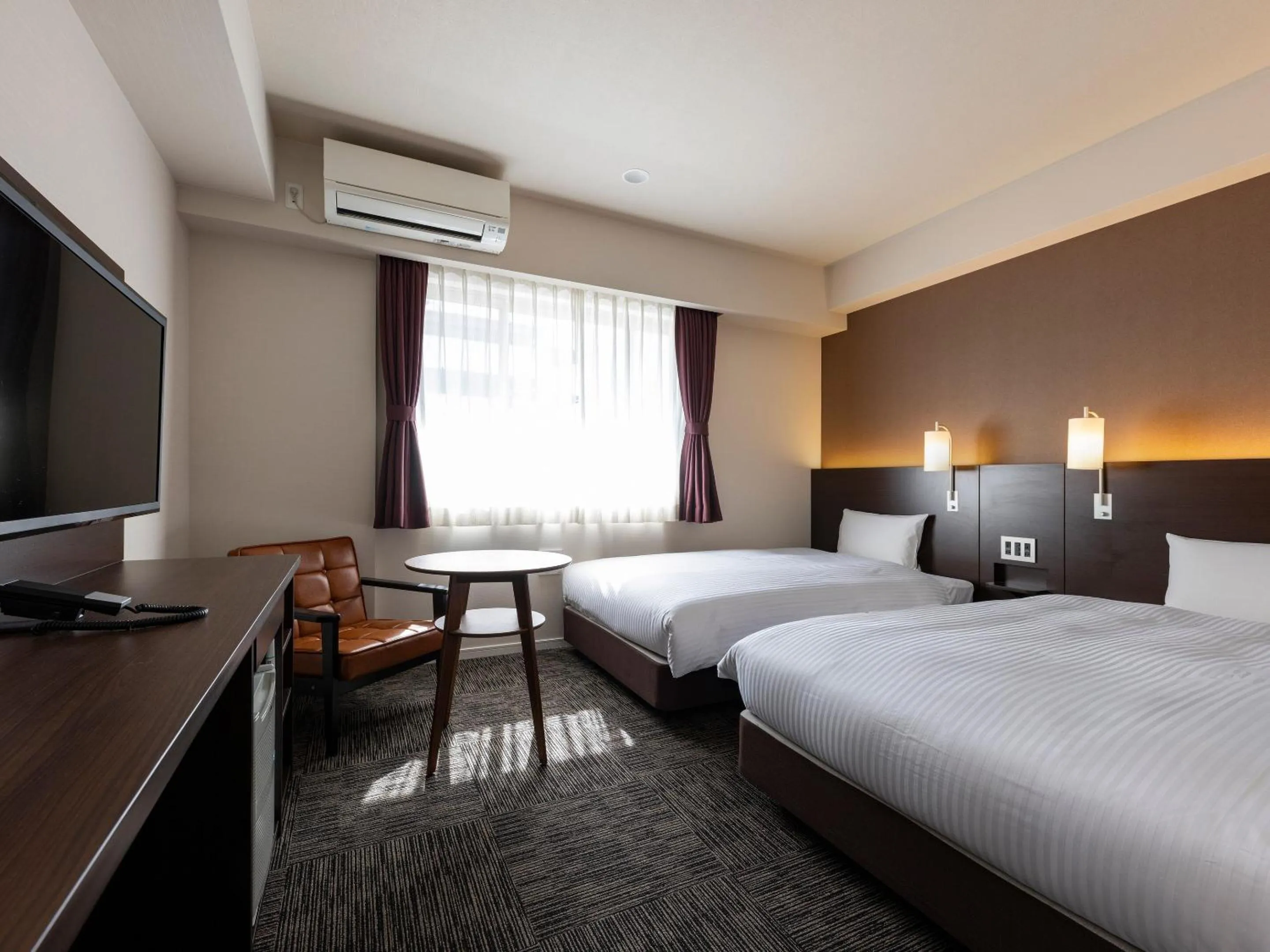 Photo of the whole room, Bed in KOKO HOTEL Osaka Shinsekai - formerly Hotel Wing Premium Osaka Shinsekai