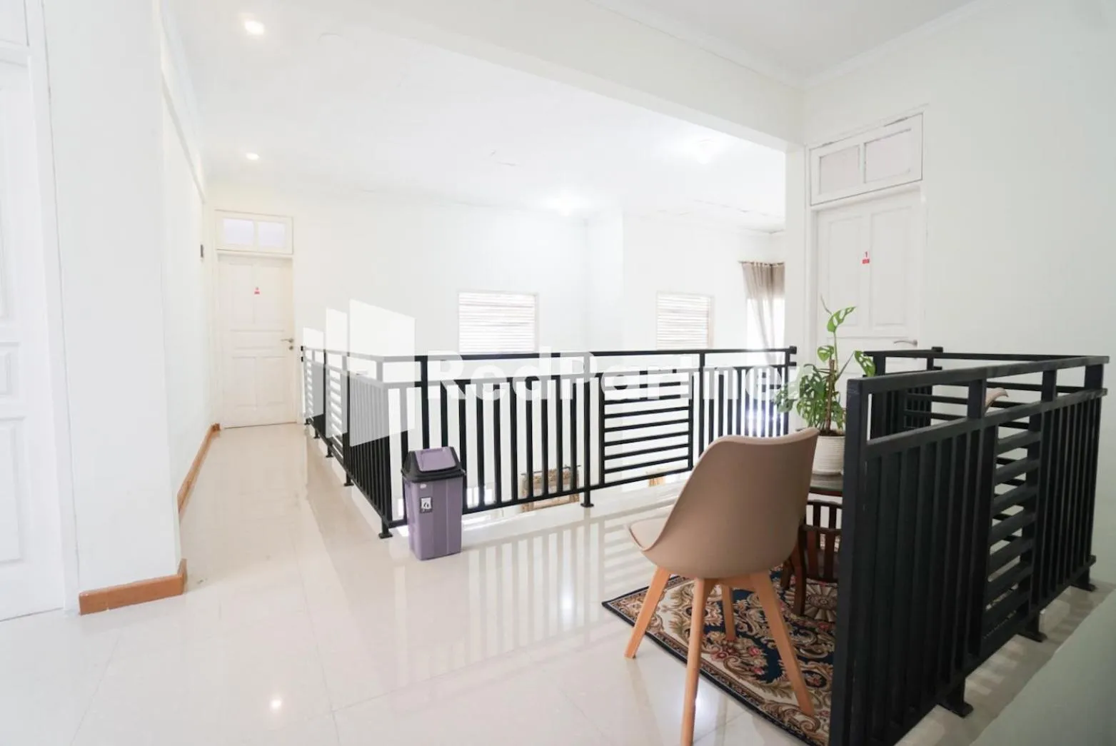 Living room in Fazza Syariah Mitra RedDoorz