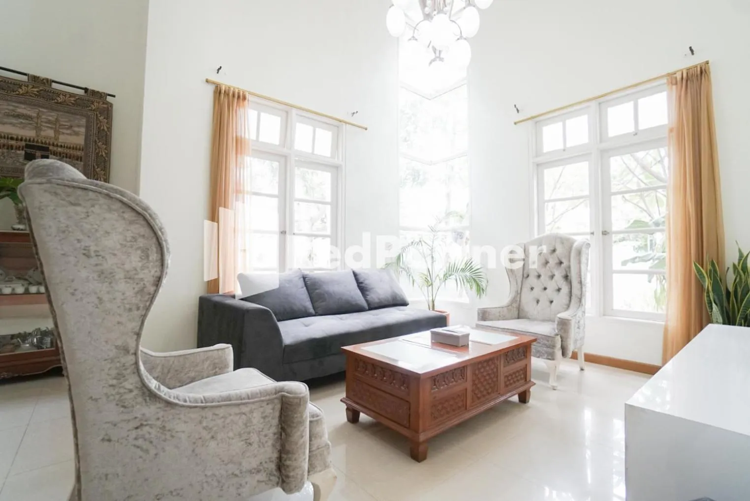 Living room in Fazza Syariah Mitra RedDoorz