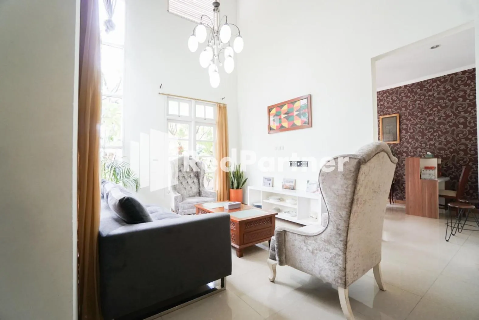 Living room in Fazza Syariah Mitra RedDoorz