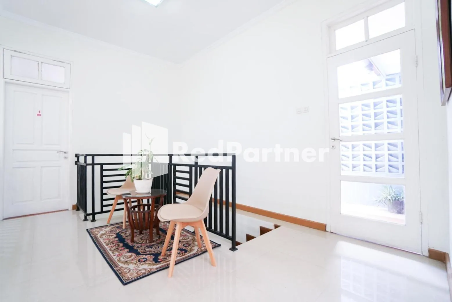 Living room, Bed in Fazza Syariah Mitra RedDoorz