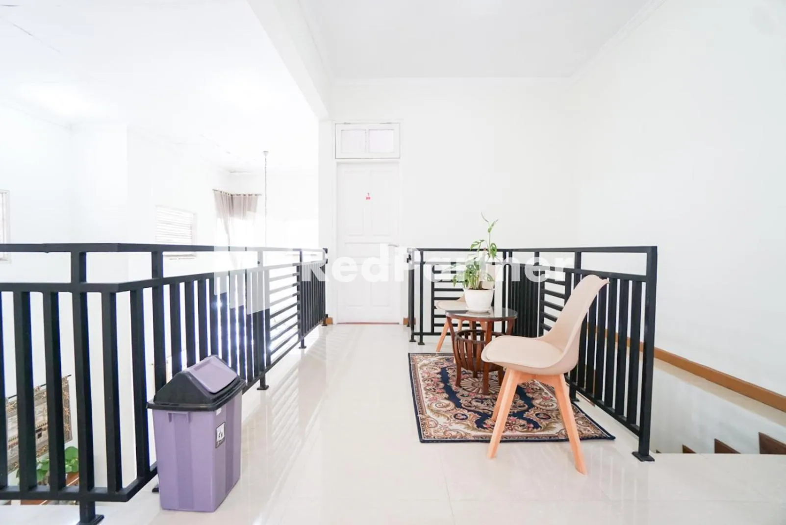 Living room in Fazza Syariah Mitra RedDoorz