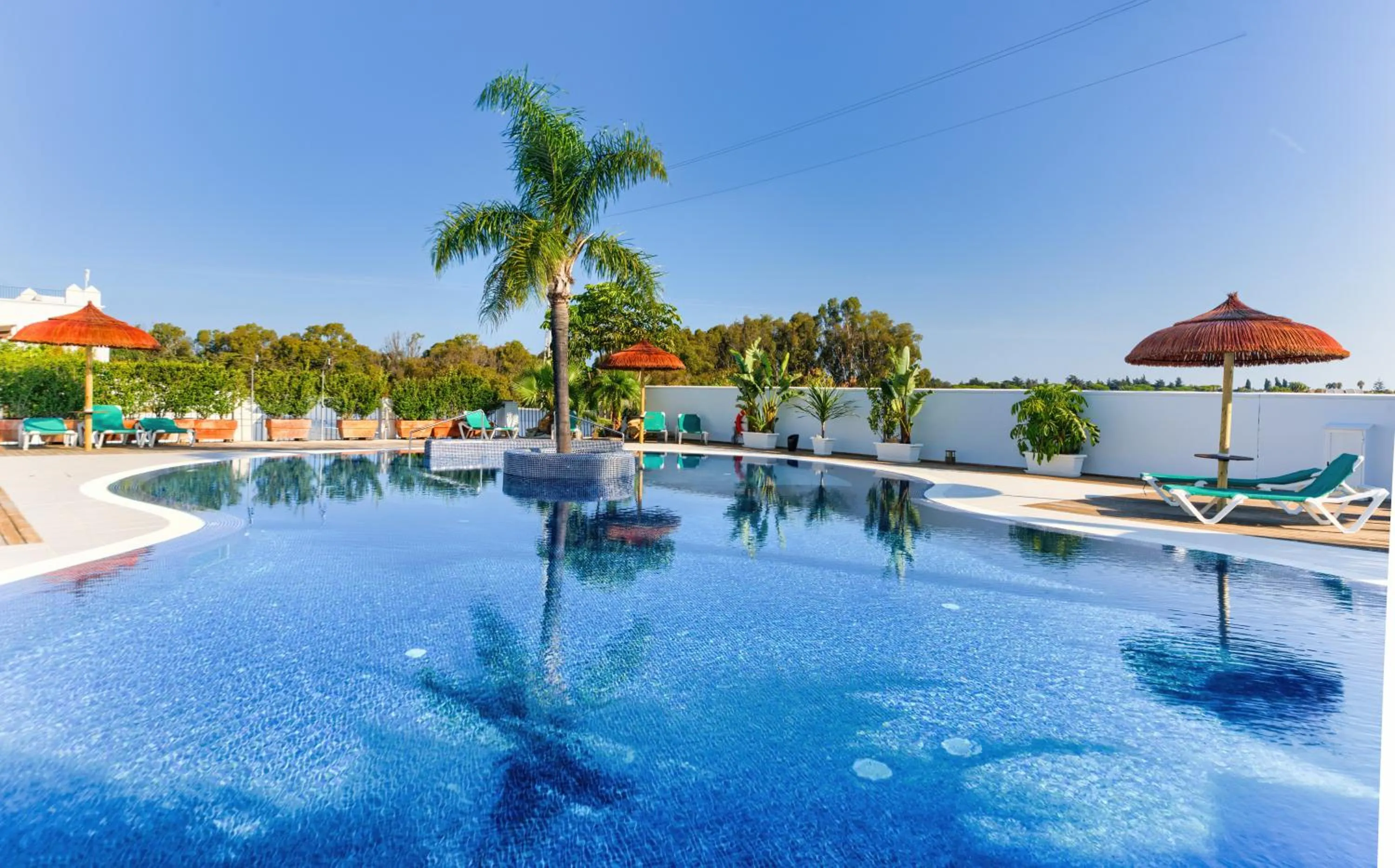 Swimming pool in Apartamentos Piedramar