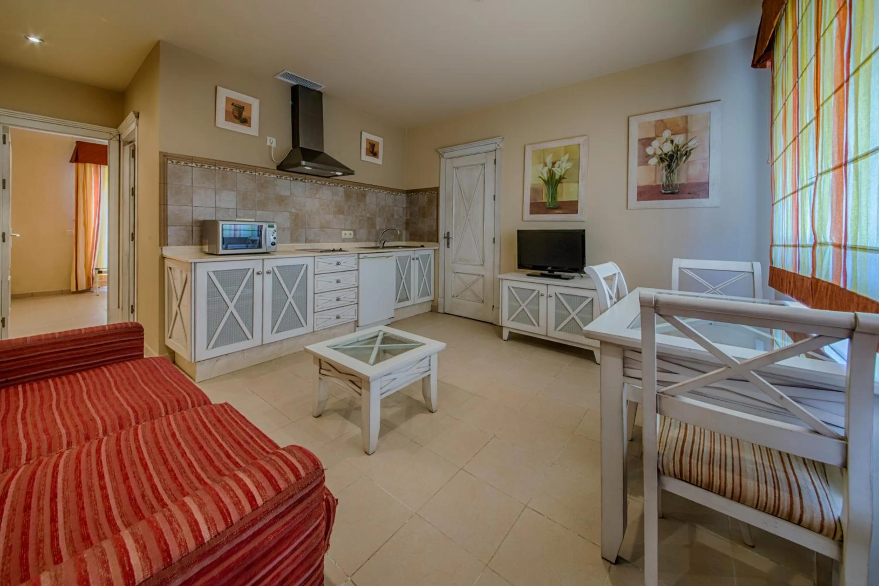 Kitchen or kitchenette, Bed in Apartamentos Piedramar